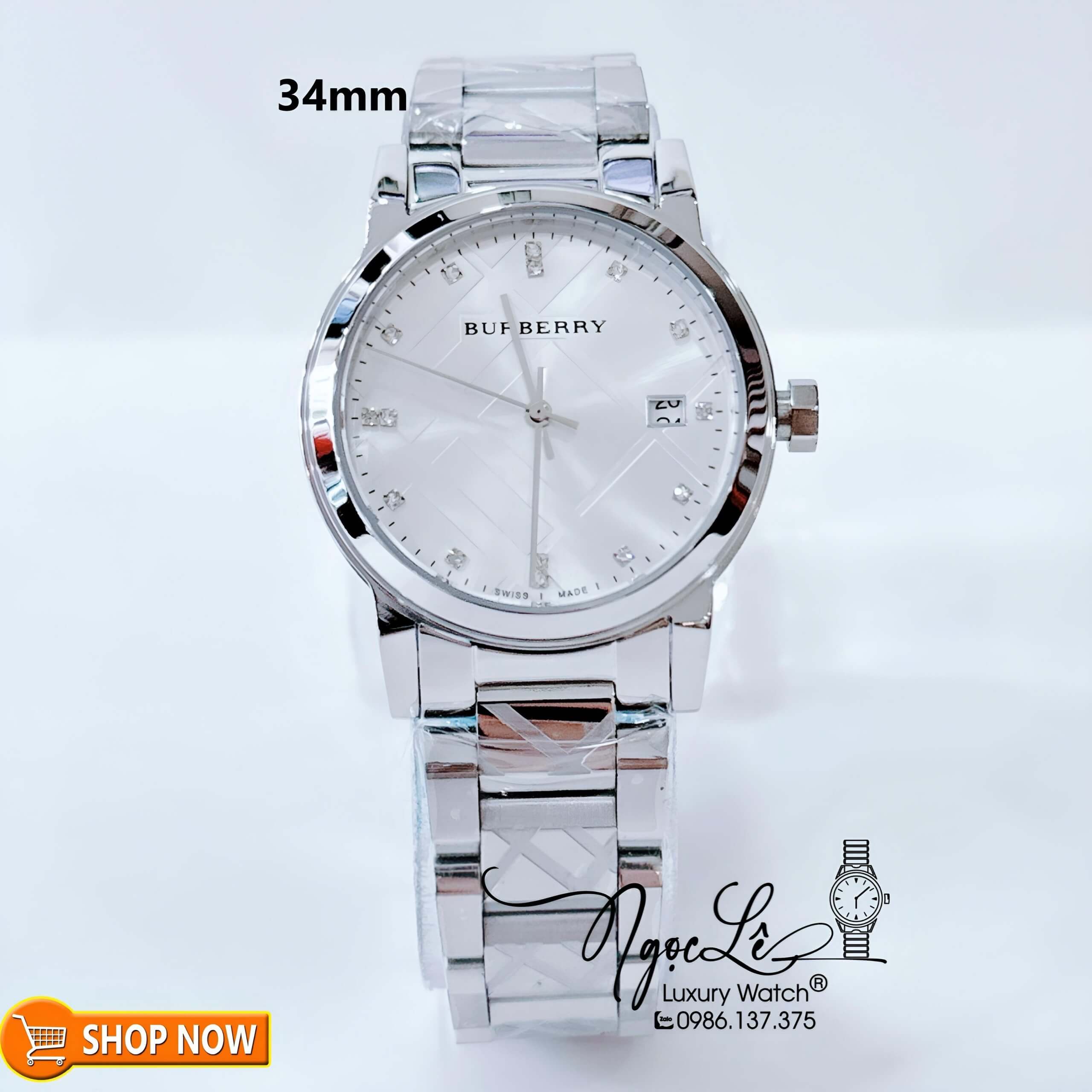 Đồng Hồ Burberry Nữ Dây Kim Loại Màu Silver Mặt Trắng Size 34mm BU9125