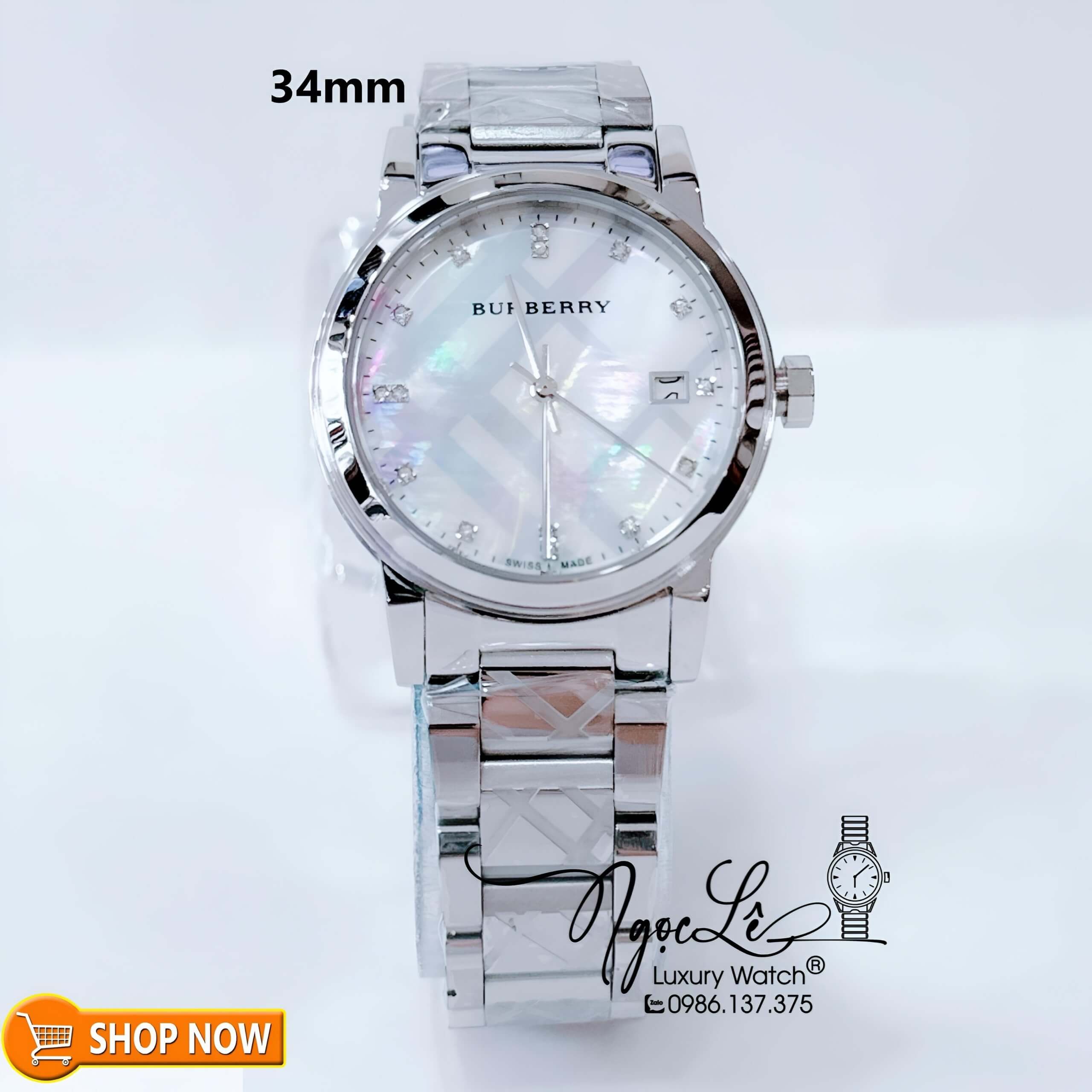 Đồng Hồ Burberry Nữ Dây Kim Loại Màu Bạc Mặt Xà Cừ Size 34mm BU9125