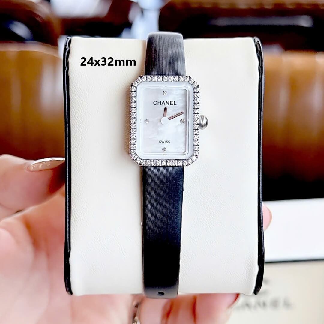 Đồng Hồ Nữ Chanel Dây Da Lụa Đen Mặt Vuông Màu Trắng Xà Cừ Size 24x32mm Viền Đá