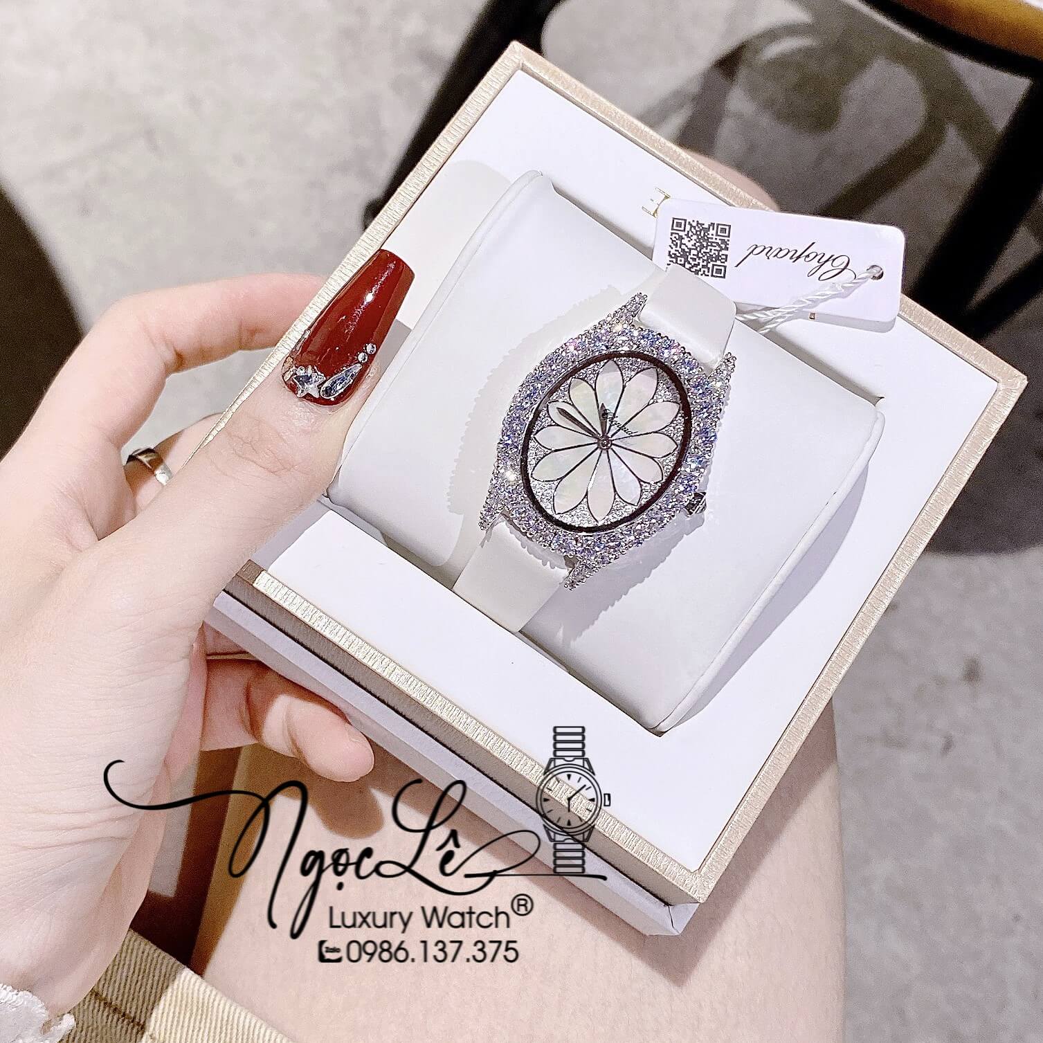 Đồng Hồ Nữ Chopard Mặt Oval Họa Tiết Hoa Xà Cừ Trắng Dây Da Lụa Màu Trắng Vỏ Silver Đính Đá Size 34mm
