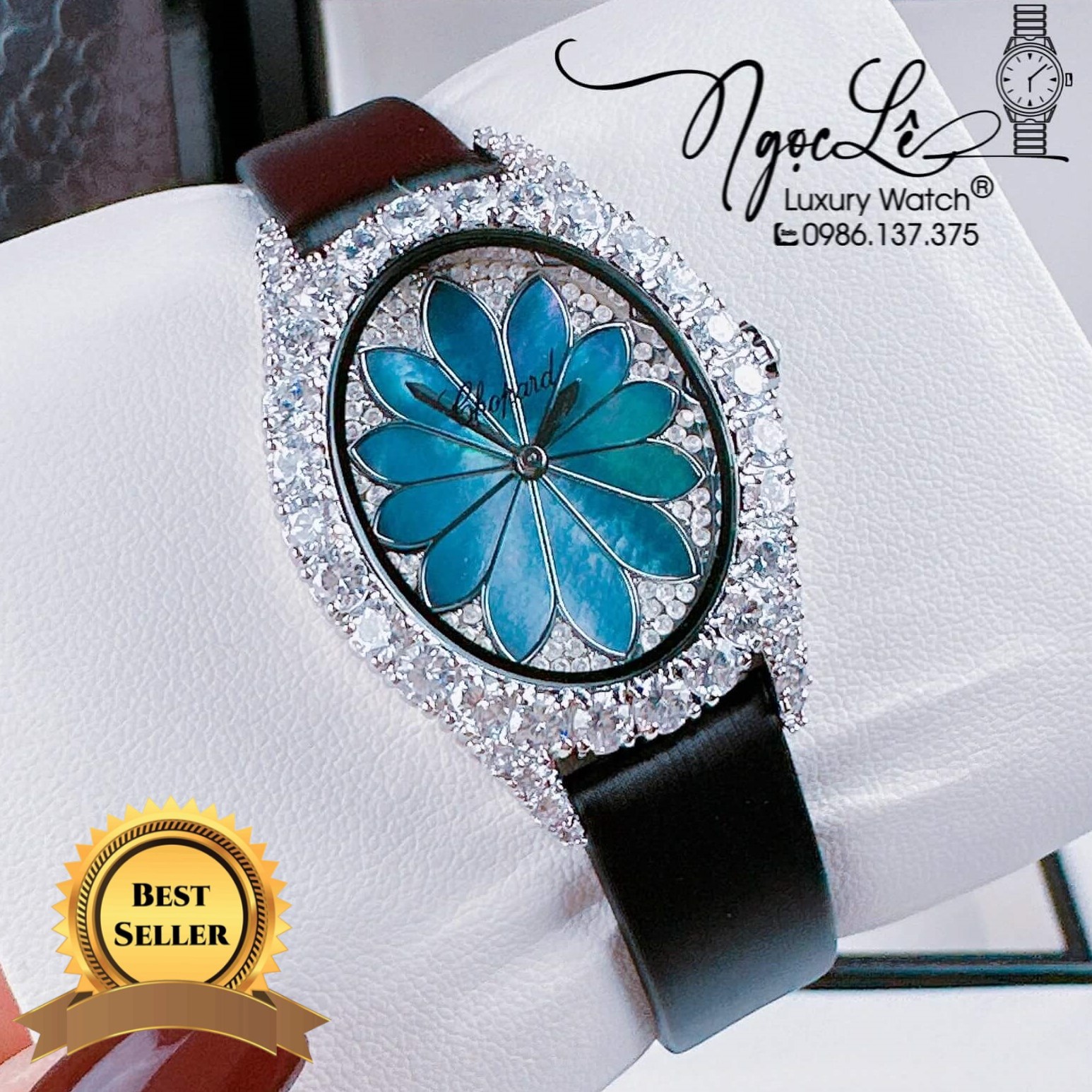 Đồng Hồ Nữ Chopard Mặt Oval Họa Tiết Hoa Xanh Xà Cừ Dây Da Lụa Màu Đen Vỏ Silver Đính Đá Size 34mm