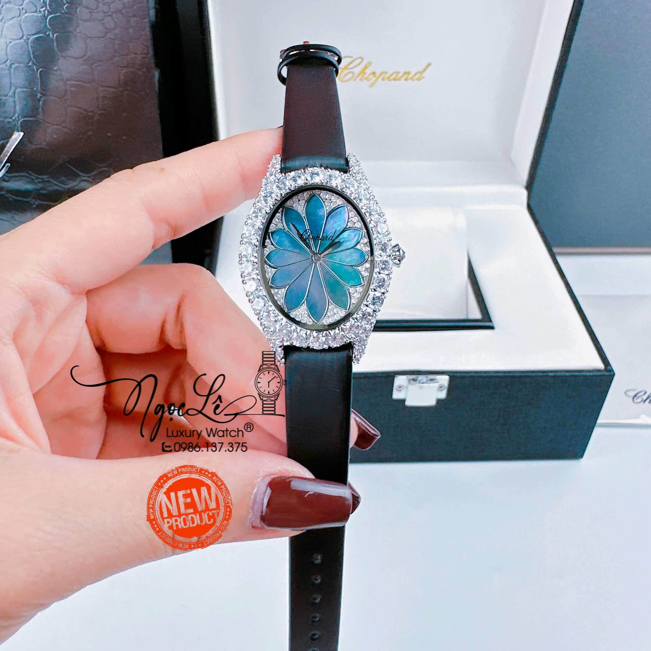 Đồng Hồ Nữ Chopard Mặt Oval Họa Tiết Hoa Xanh Xà Cừ Dây Da Lụa Màu Đen Vỏ Silver Đính Đá Size 34mm