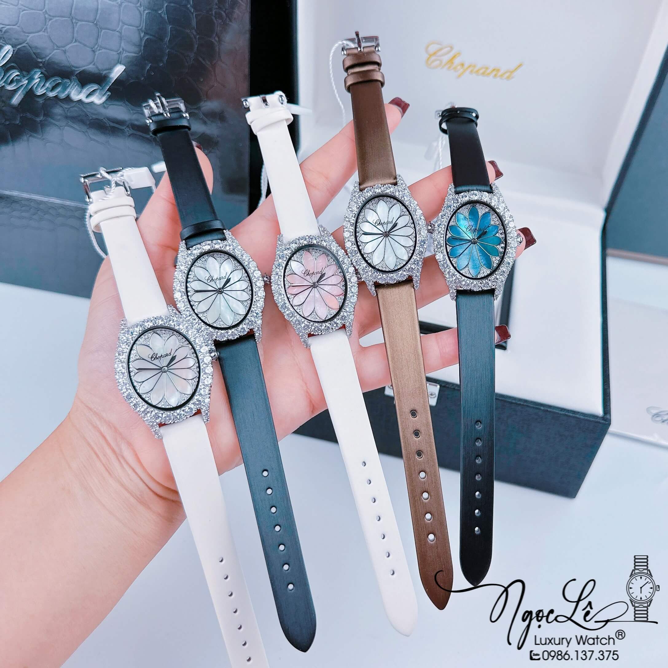 Đồng Hồ Nữ Chopard Mặt Oval Họa Tiết Hoa Xanh Xà Cừ Dây Da Lụa Màu Đen Vỏ Silver Đính Đá Size 34mm