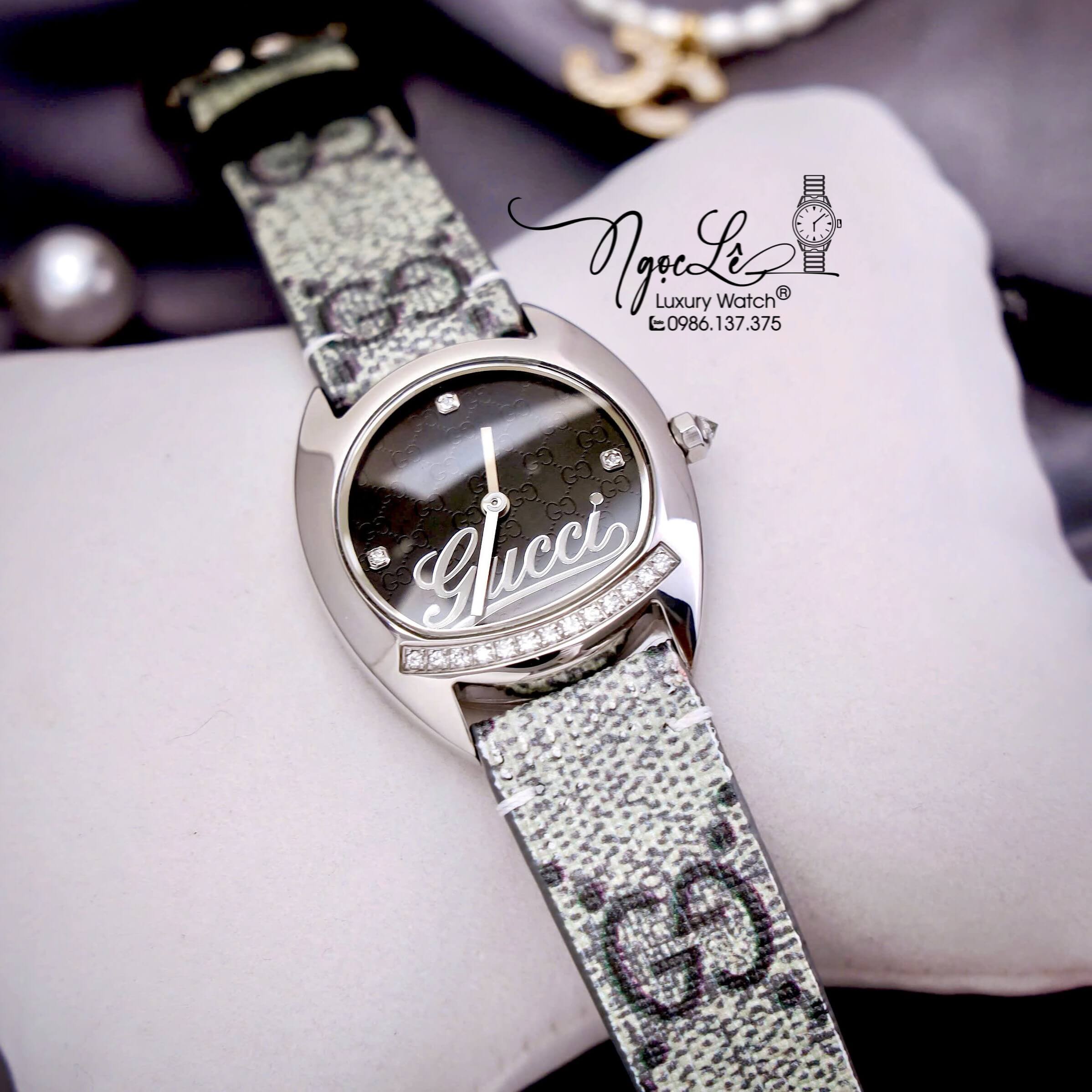 Đồng Hồ Nữ Gucci Dây Da Họa Tiết Logo GC Mặt Oval Đen Cao Cấp Size 34mm Quartz