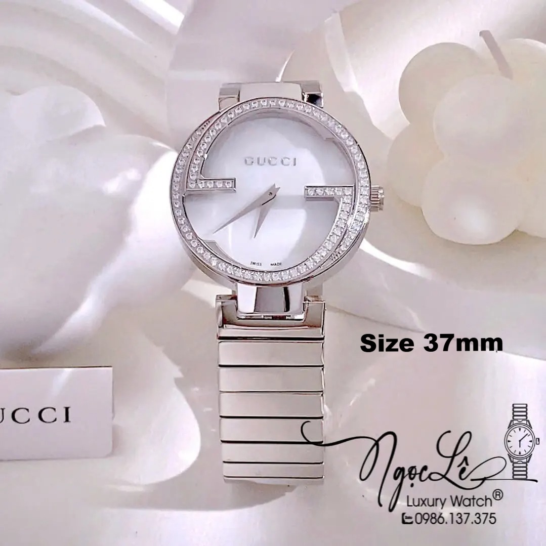 Đồng Hồ Nữ Gucci Dây Kim Loại Silver Mặt Trắng Dáng Lắc Tay Đính Đá Size 37mm