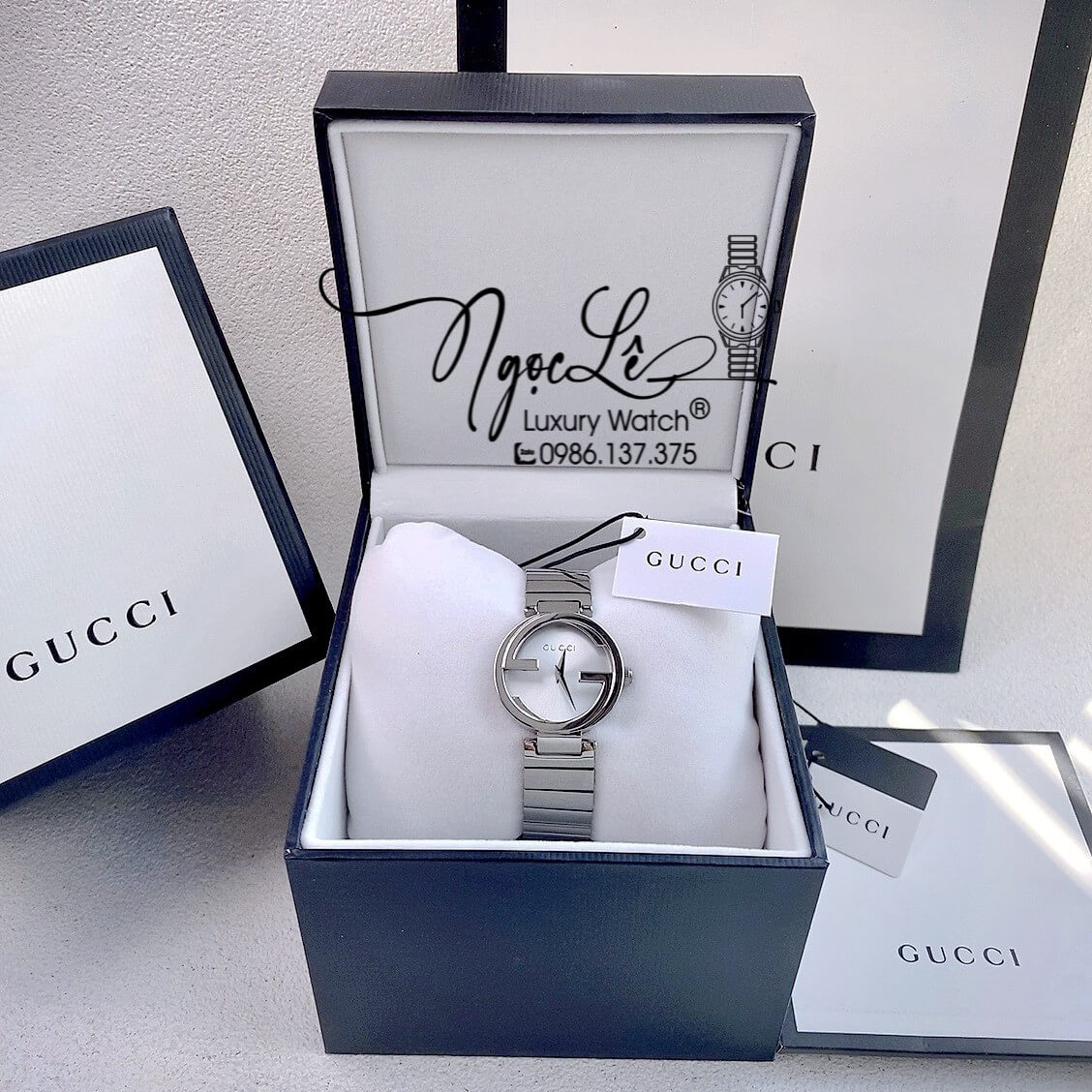 Đồng Hồ Nữ Gucci Dây Kim Loại Silver Mặt Trắng Dáng Lắc Tay Niềng Trơn Size 29mm