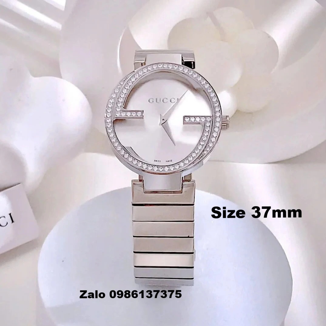 Đồng Hồ Nữ Gucci Dây Kim Loại Silver Mặt Trắng Ngà Dáng Lắc Tay Đính Đá Size 37mm