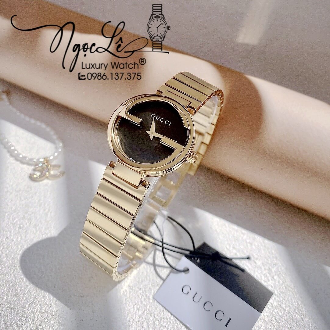 Đồng Hồ Nữ Gucci Dây Kim Loại Vàng Mặt Đen Dáng Lắc Tay Niềng Trơn Size 29mm