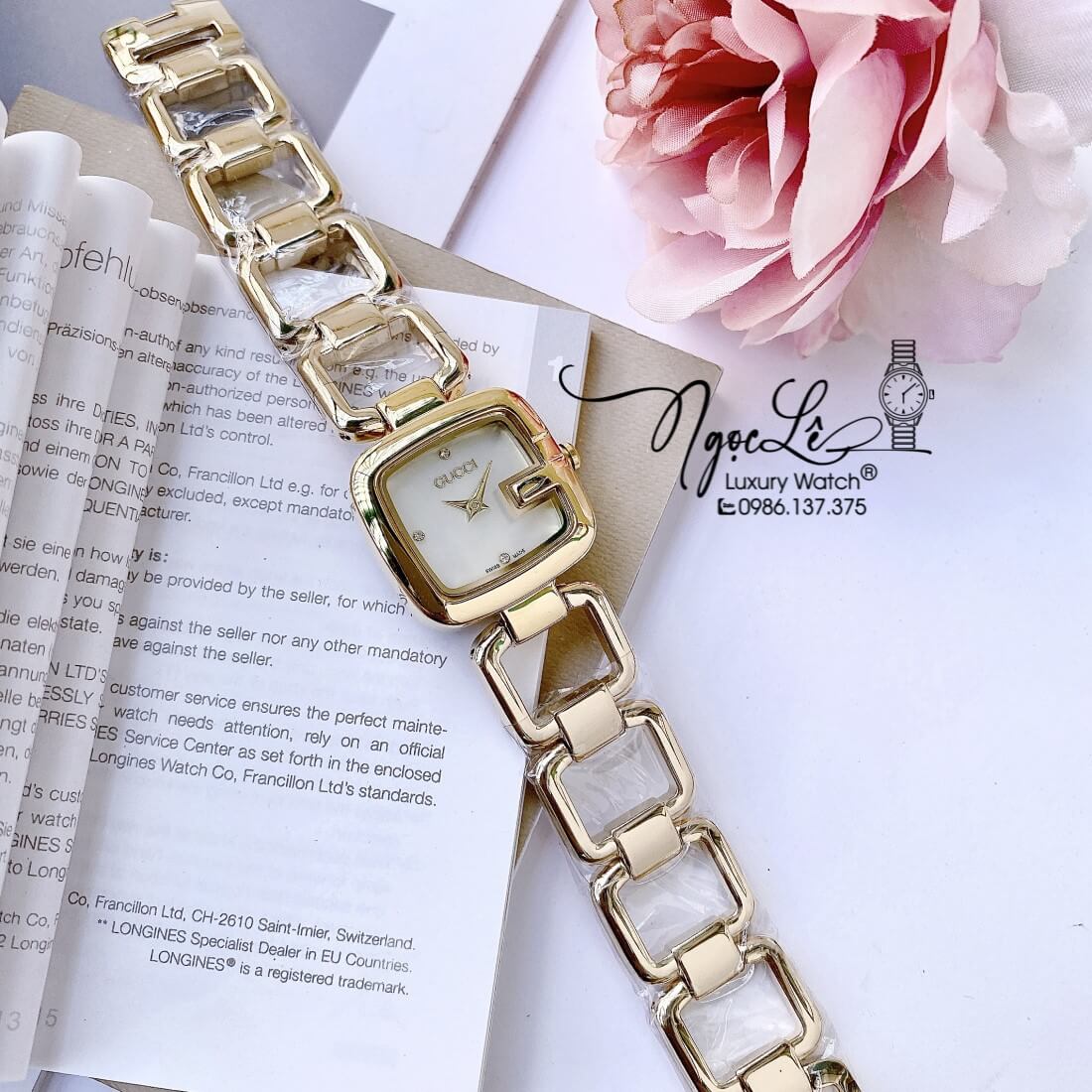 Đồng Hồ Nữ Gucci G-Gucci Dây Kim Loại Dáng Lắc Tay Vàng Mặt Trắng Size 32mm