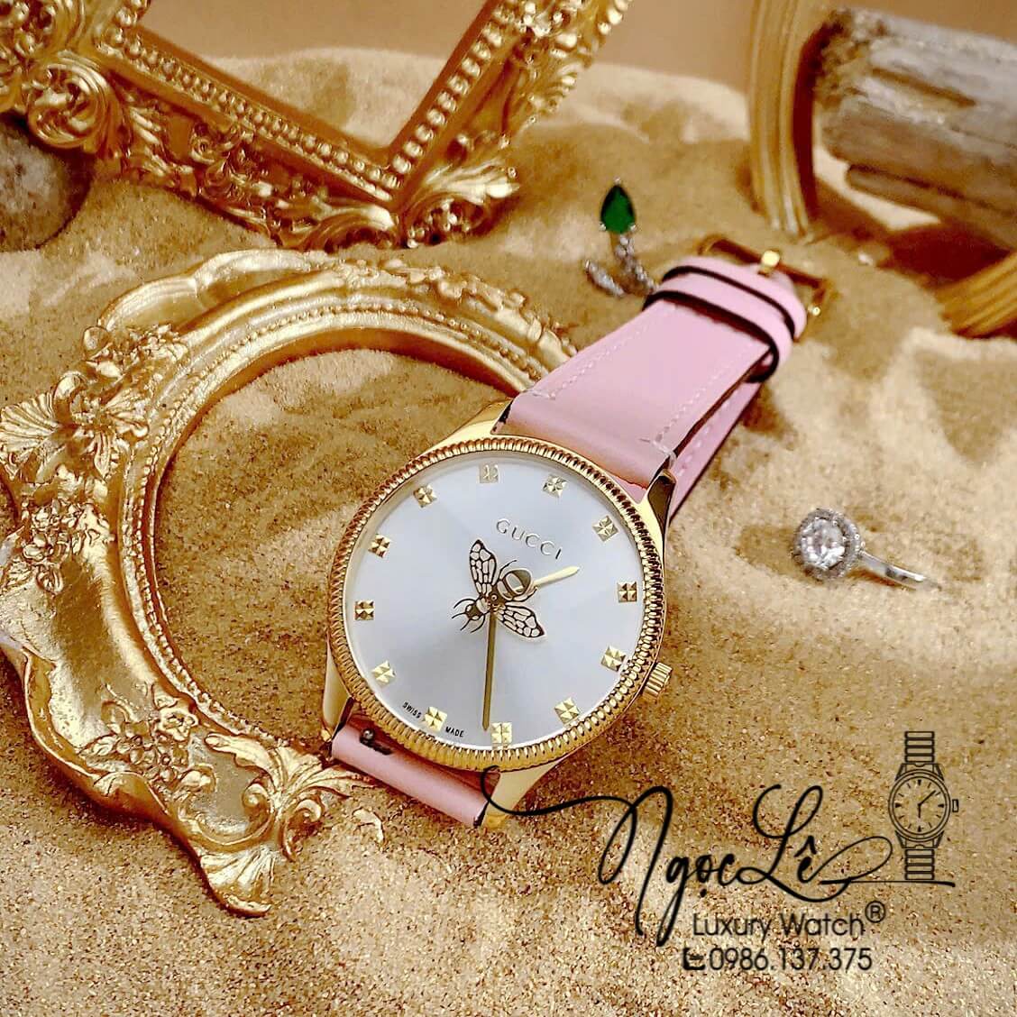 Đồng Hồ Nữ Gucci G-Timeless Dây Da Hồng Mặt Ong Size 36mm