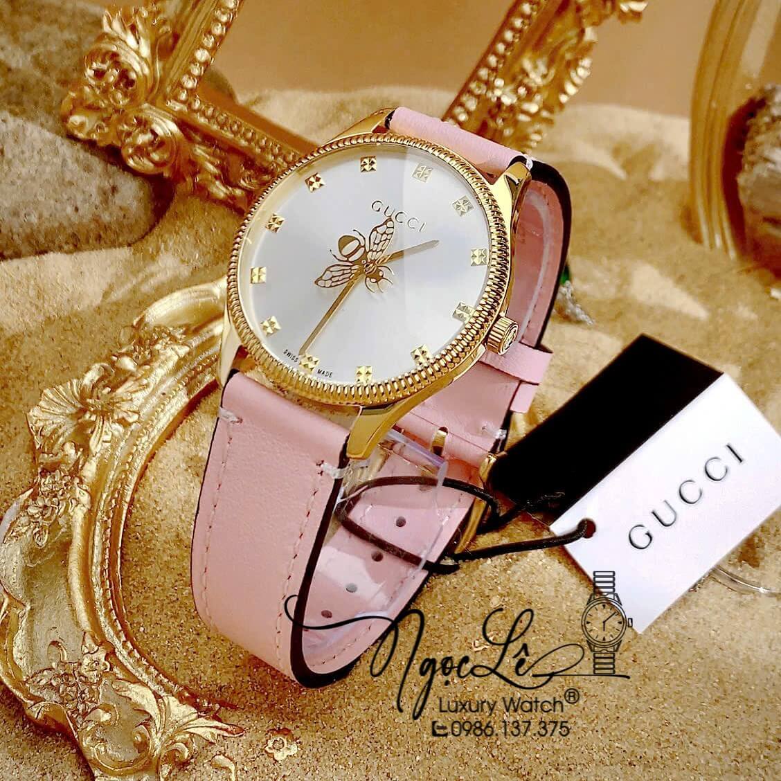 Đồng Hồ Nữ Gucci G-Timeless Dây Da Hồng Mặt Ong Size 36mm