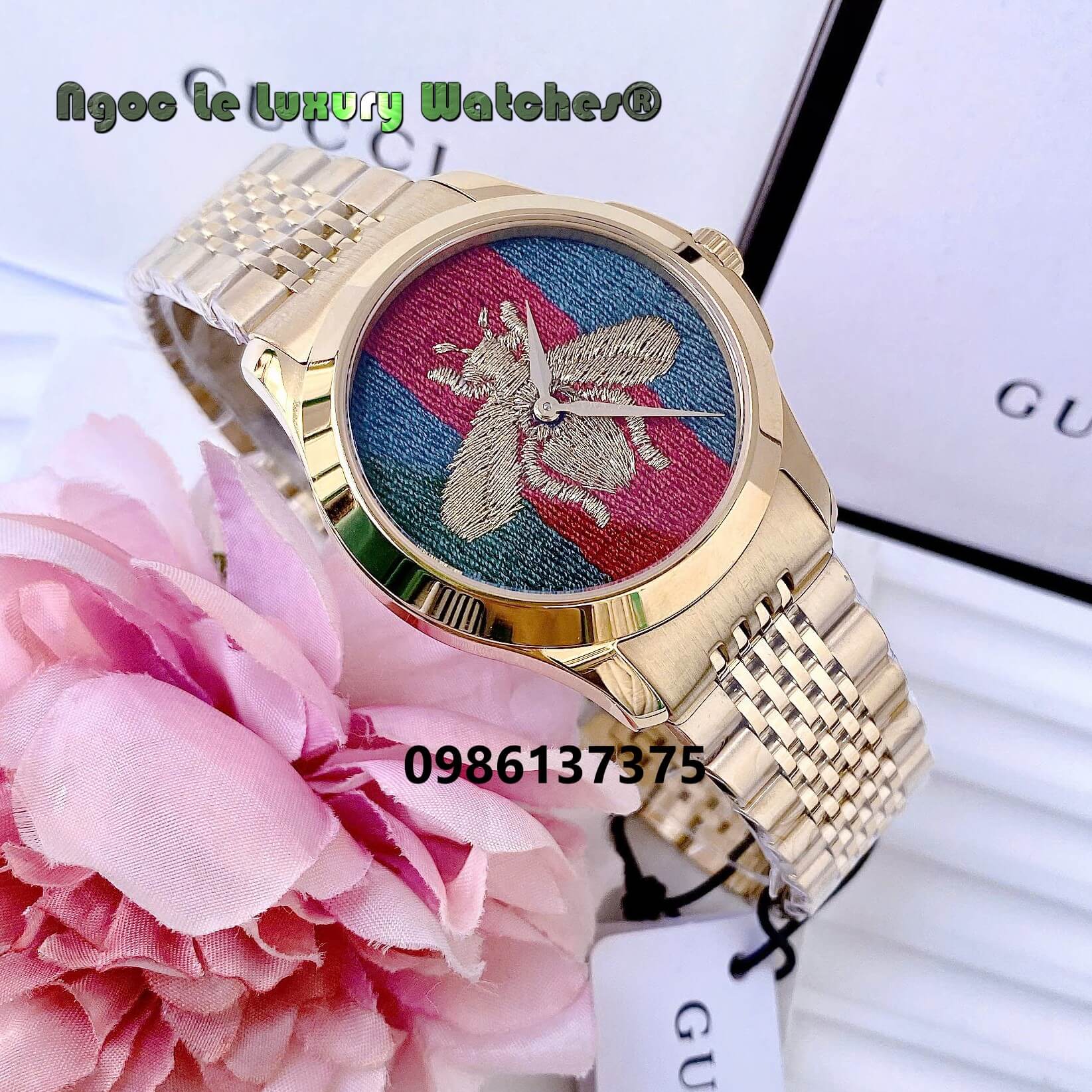 Đồng Hồ Nữ Gucci G Timeless Dây Kim Loại Vàng Mặt Ong Xanh Sọc Đỏ Size 37mm