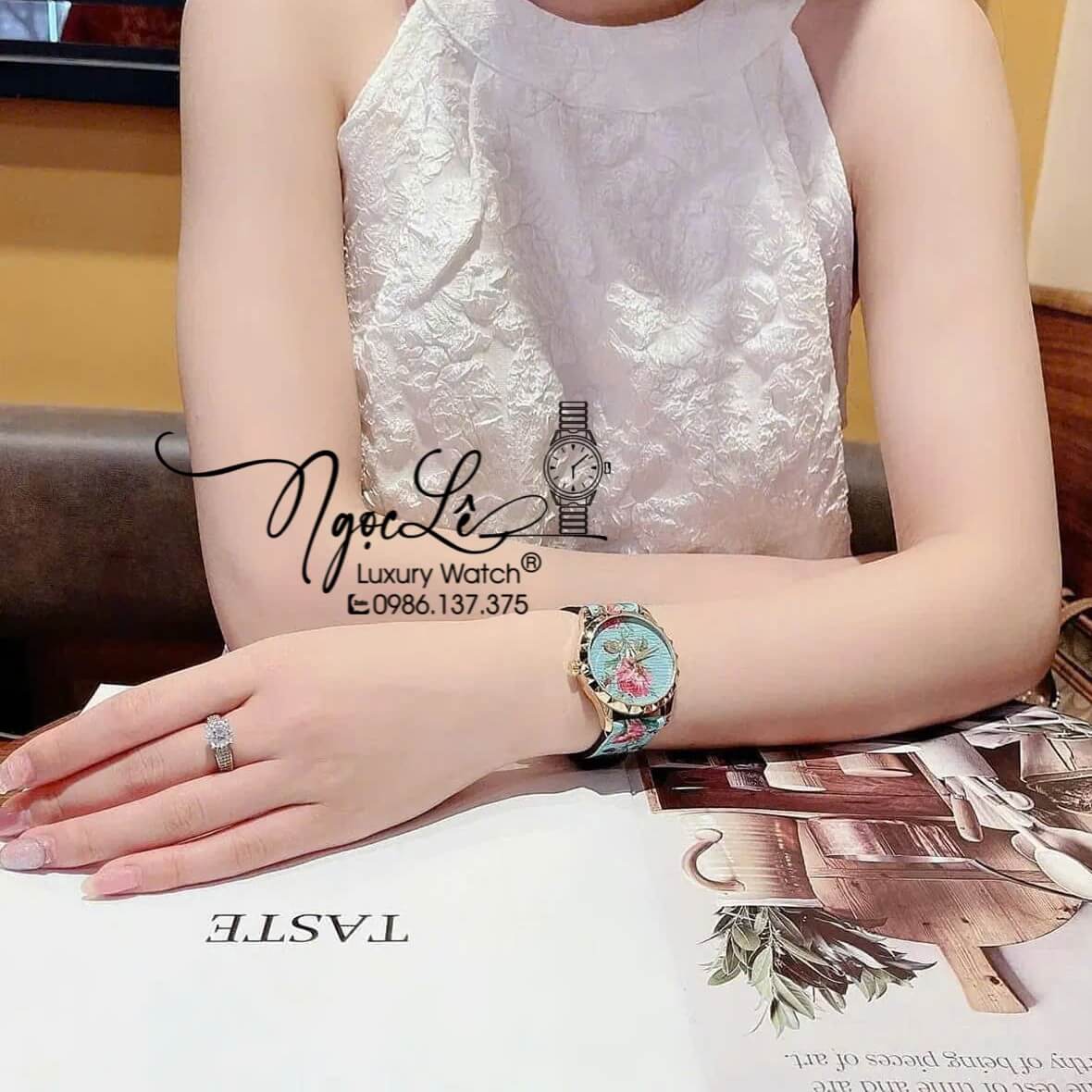 Đồng Hồ Nữ Gucci G-Timeless YA1264085 Dây Da Màu Xanh Họa Tiết Hoa Màu Hồng Size 38mm