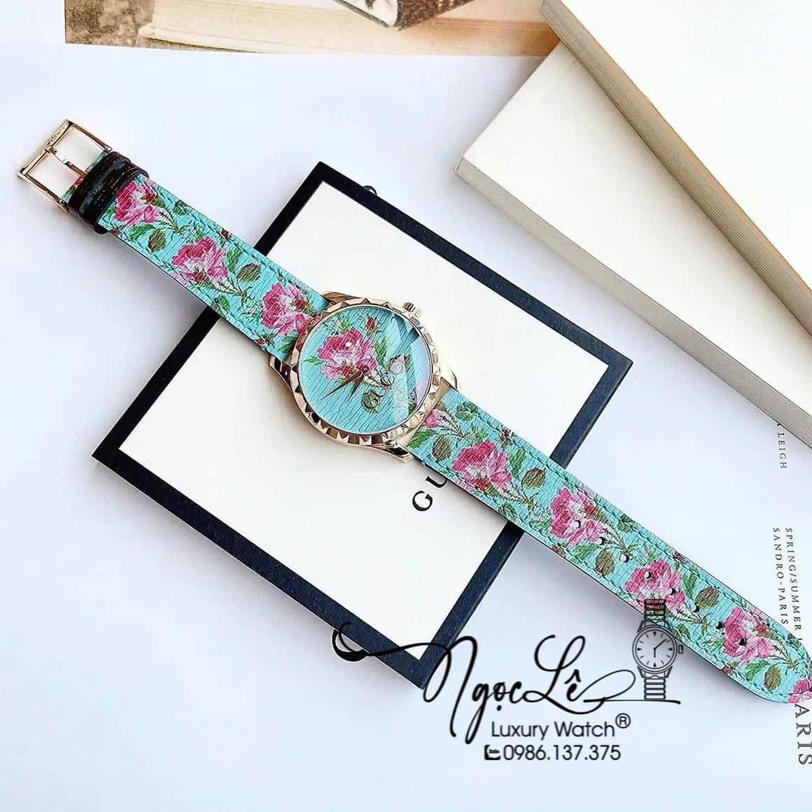 Đồng Hồ Nữ Gucci G-Timeless YA1264085 Dây Da Màu Xanh Họa Tiết Hoa Màu Hồng Size 38mm
