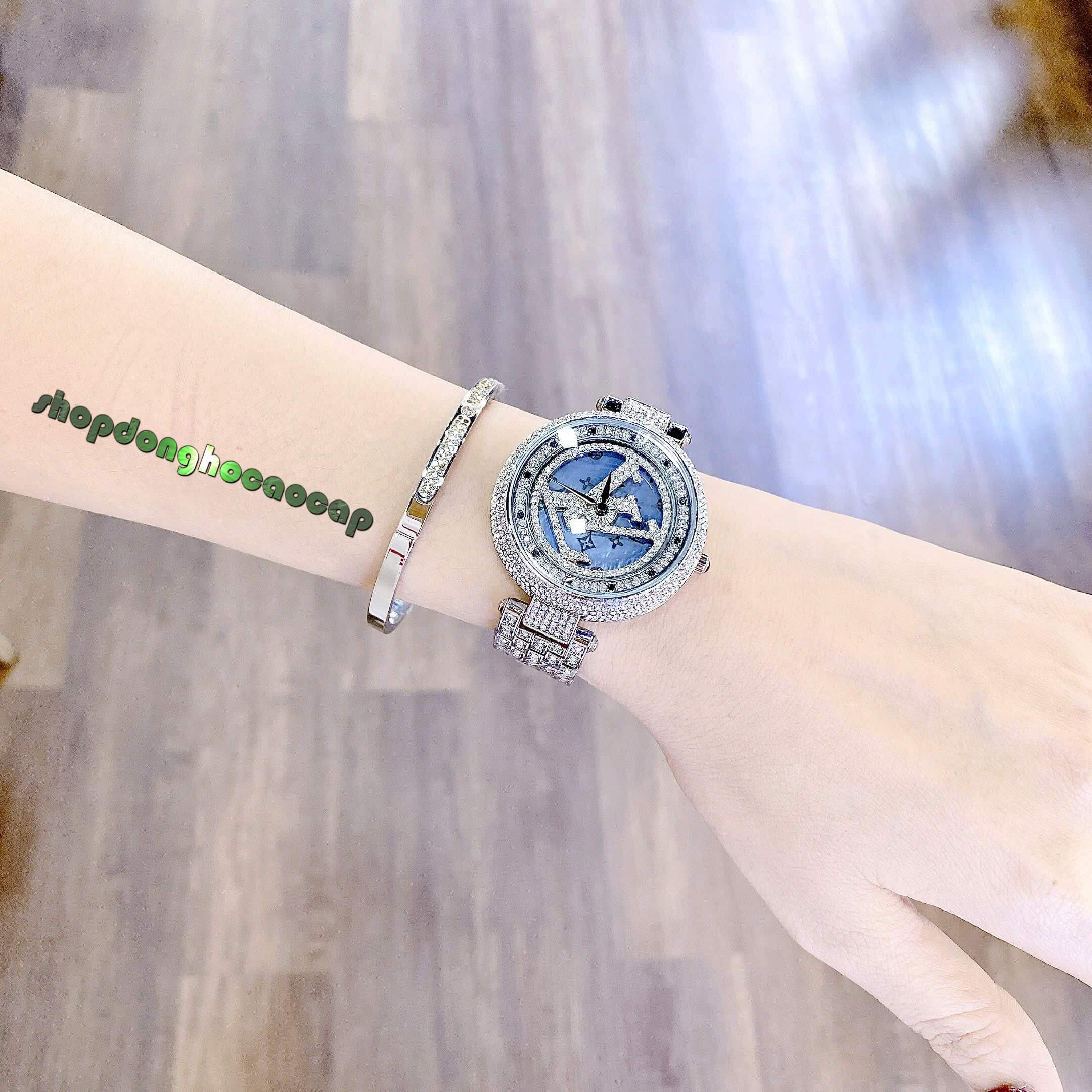 Đồng Hồ Nữ Louis Vuitton Dây Silver Đính Đá Xanh Mặt Xoay Cao Cấp Size 38mm - Quartz