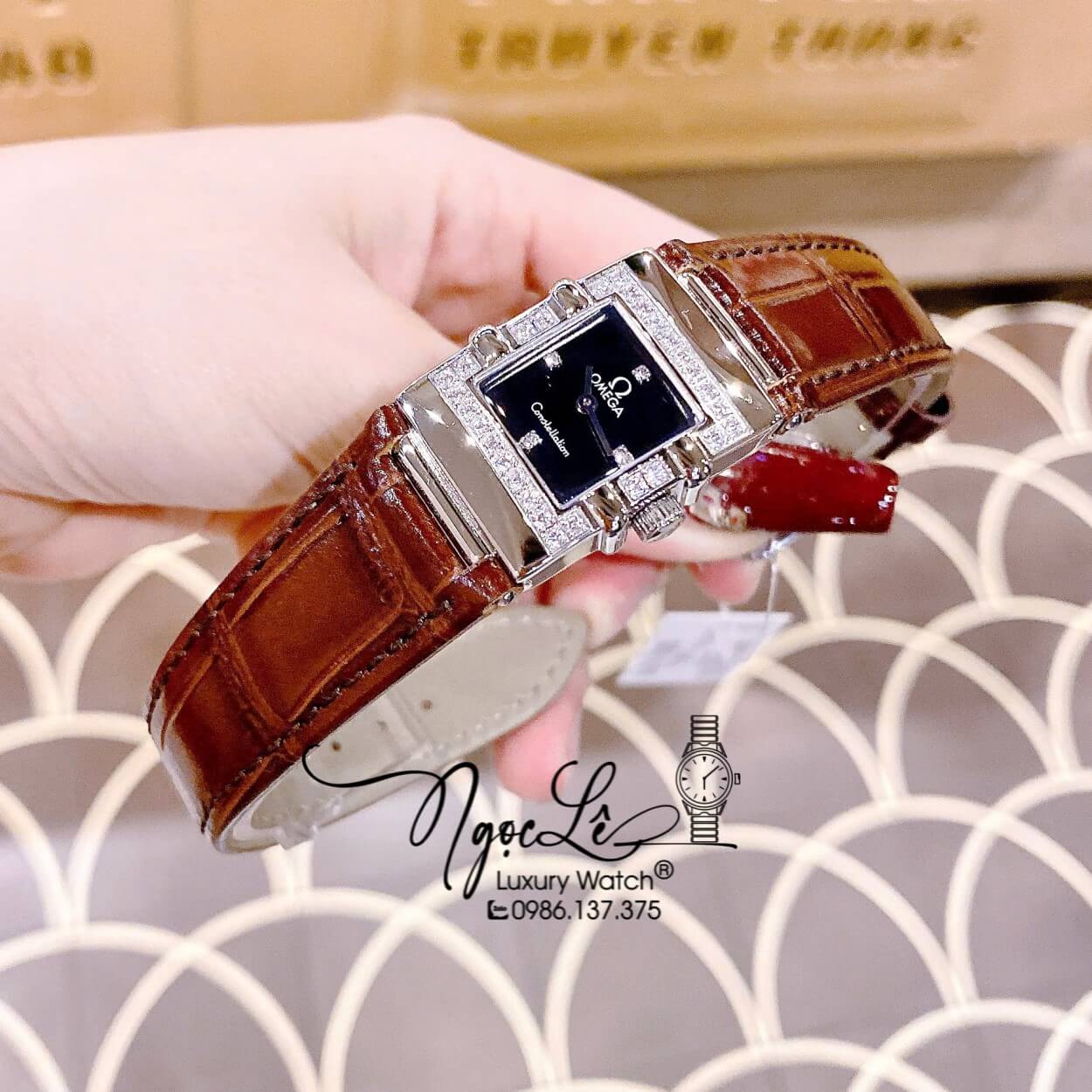 Đồng Hồ Nữ Omega Constellation Dây Da Nâu Mặt Vuông Viền Đá Size 22x28mm - Quartz Japan