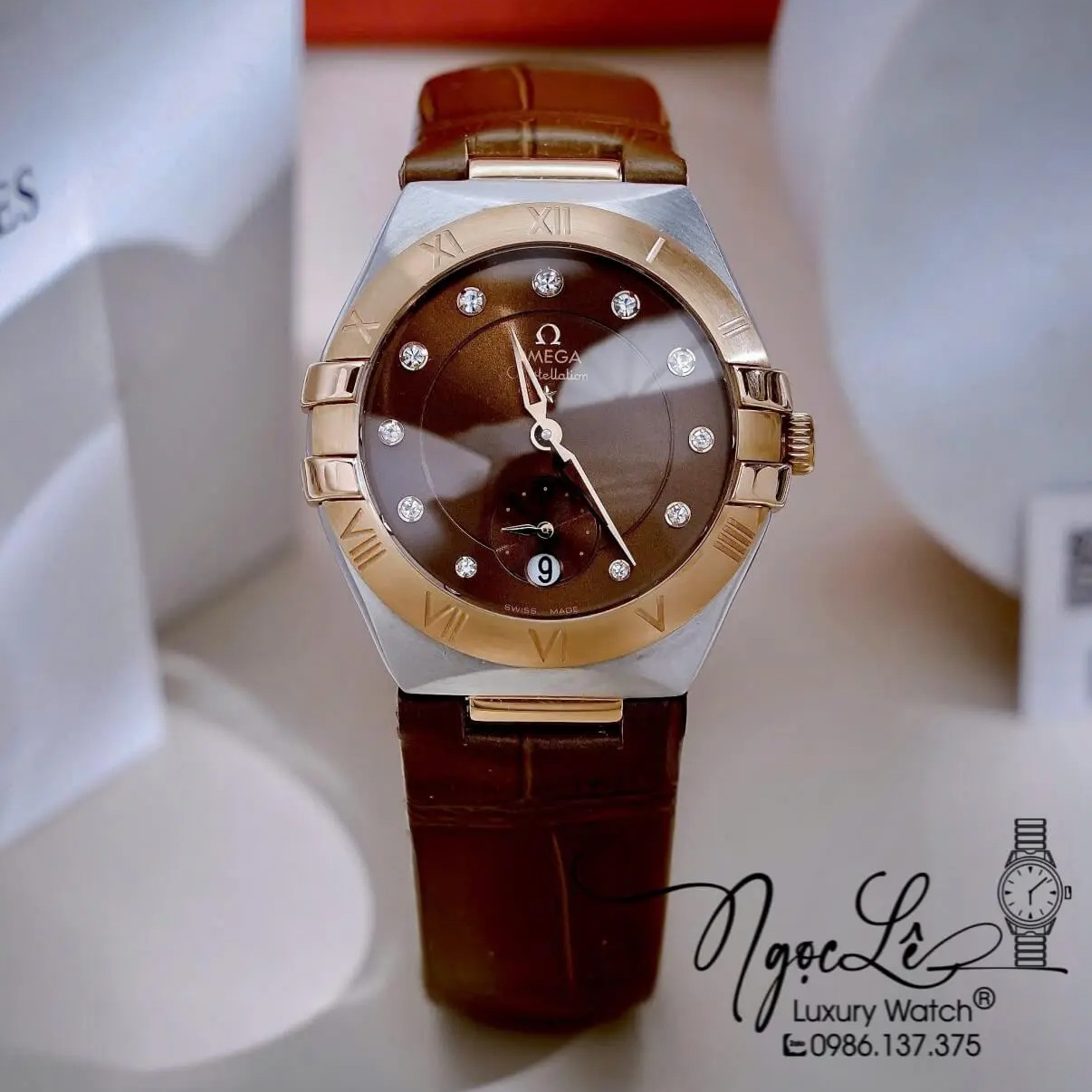 Đồng Hồ Nữ Omega Constellation Dây Da Nâu Vỏ Demi Rose Niềng Trơn Size 34mm - Quartz Japan