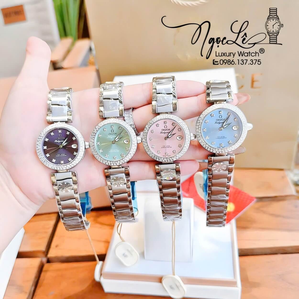 Đồng Hồ Nữ Omega De Ville Dây Kim Loại Silver Mặt Xanh Da Trời Đính Đá Size 34mm