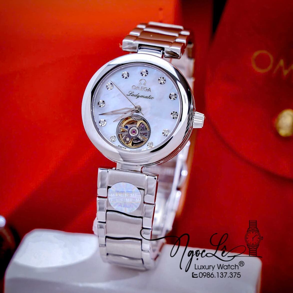 Đồng Hồ Nữ Omega Ladymatic Dây Kim Loại Màu Bạc Mặt Trắng Xà Cừ Size 34mm (Automatic)