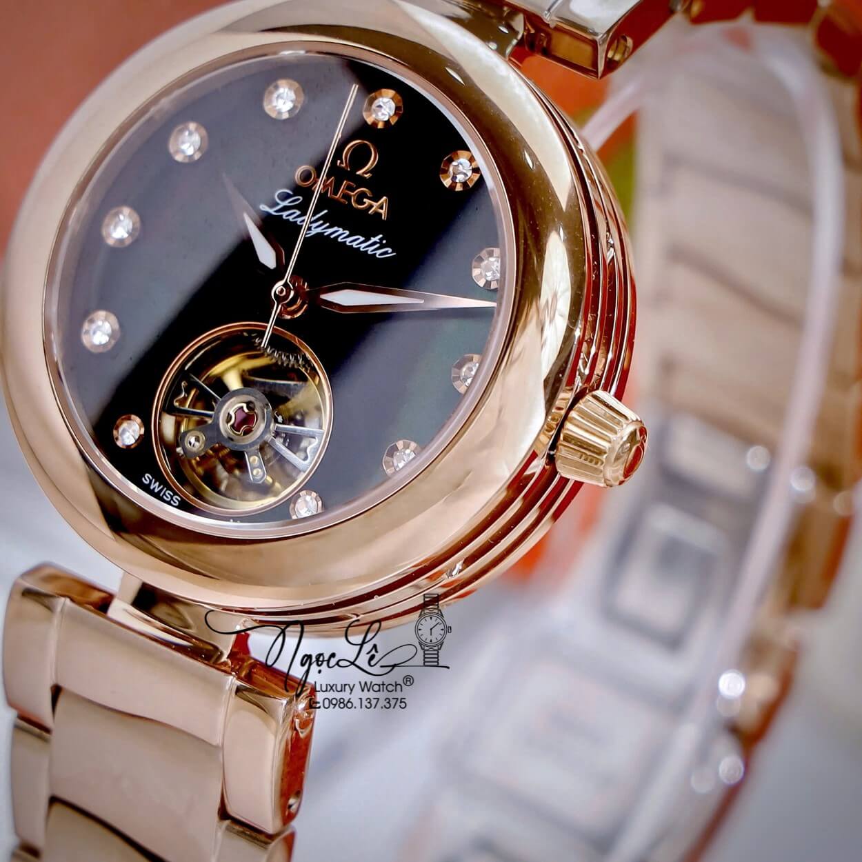 Đồng Hồ Nữ Omega Ladymatic Dây Kim Loại Rose Gold Mặt Đen Xà Cừ Size 34mm (Automatic)