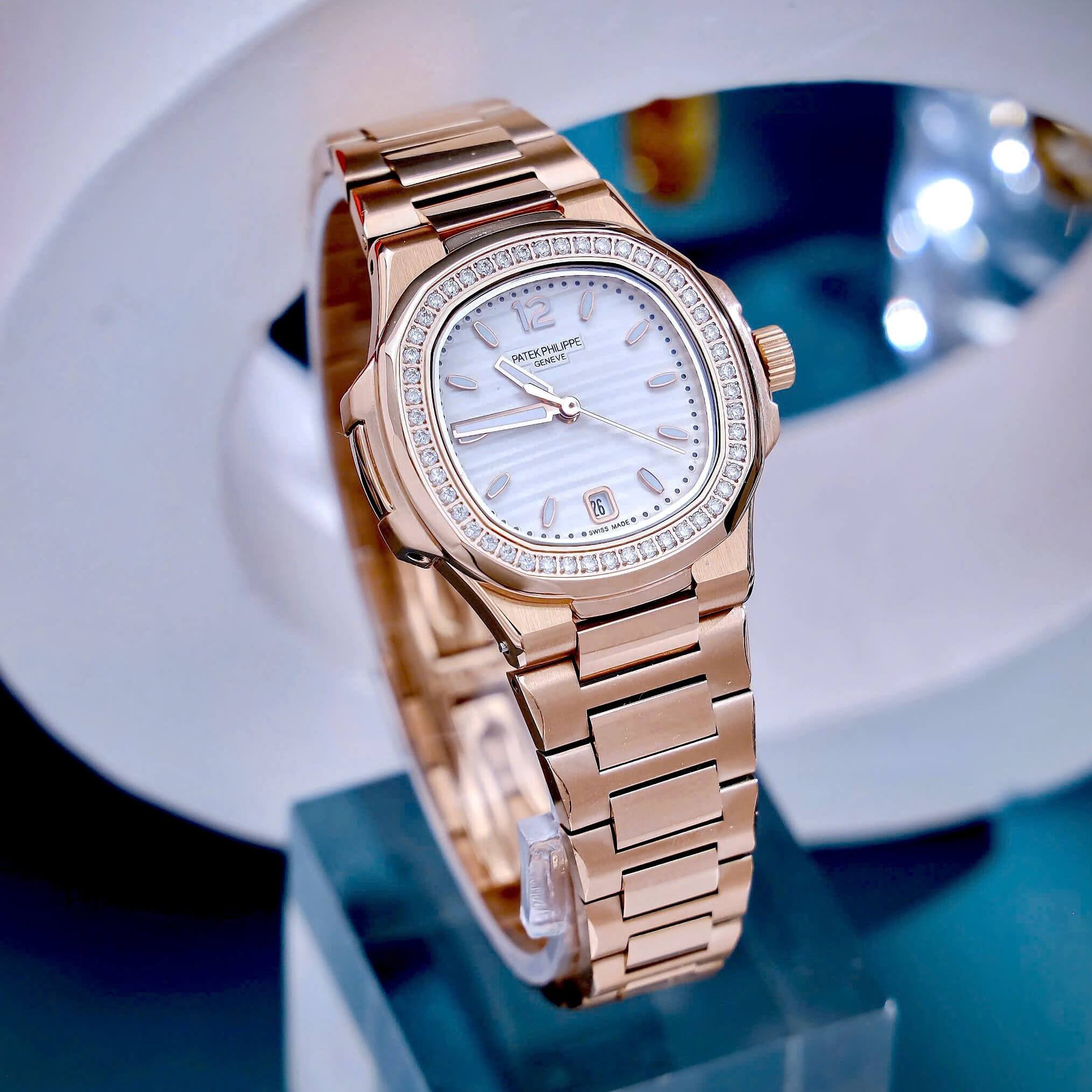 Đồng Hồ Nữ Patek Philippe Nautilus Dây Kim Loại Rose Gold Mặt Trắng Viền Đính Đá 32mm - Quartz