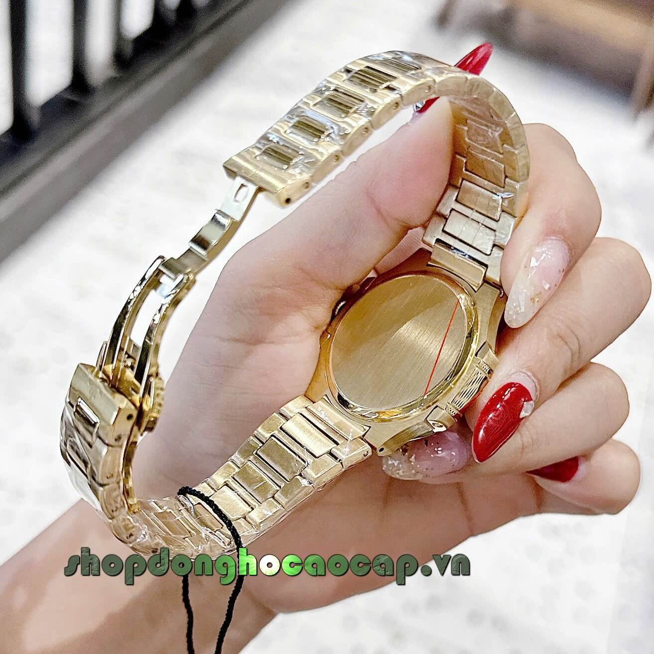 Đồng Hồ Nữ Patek Philippe Nautilus Dây Vàng Gold Mặt Đen Máy Thụy Sĩ Size 36mm - Viền Đá