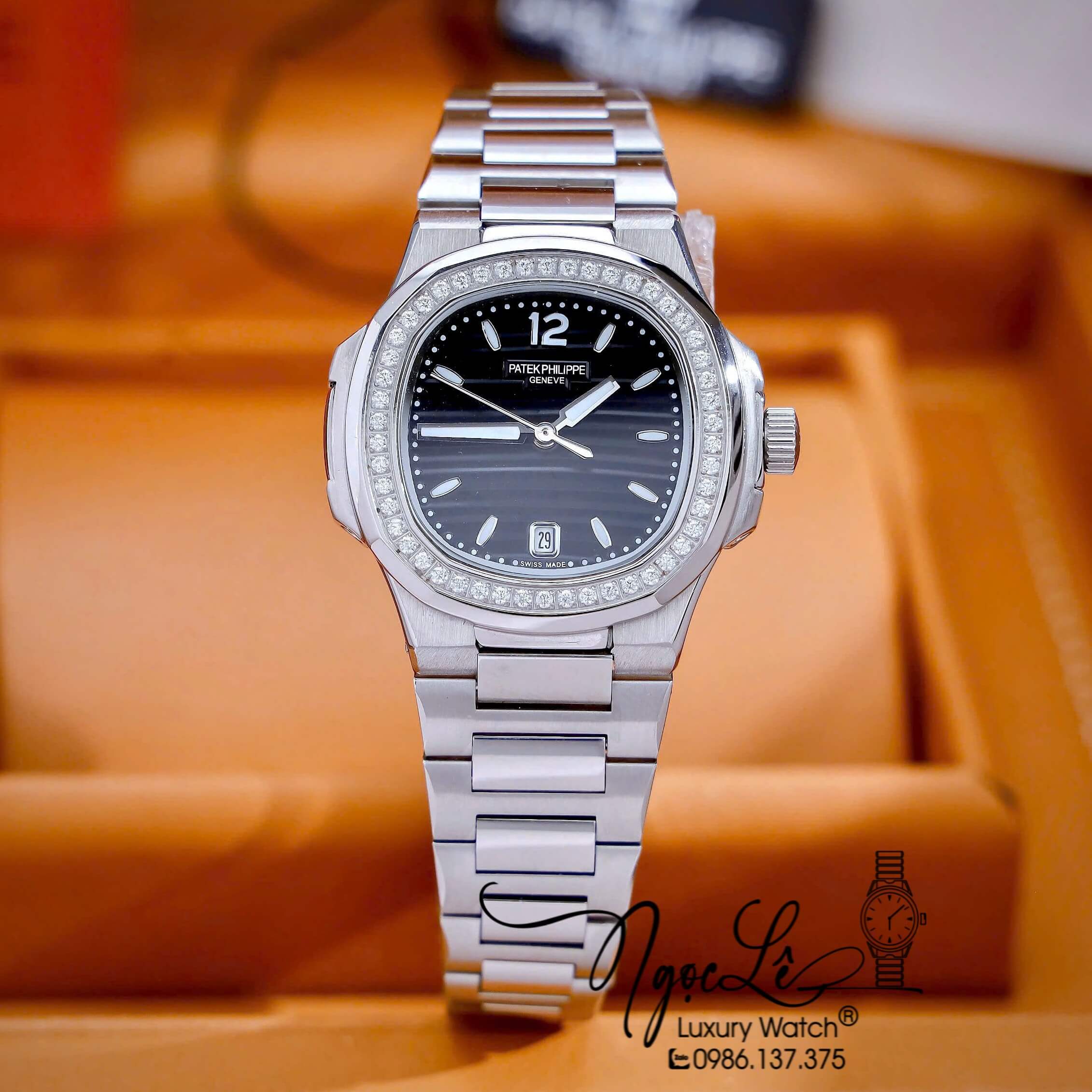 Đồng Hồ Nữ Patek Philippe Nautilus Dây Kim Loại Silver Mặt Đen Viền Đính Đá 32mm - Quartz