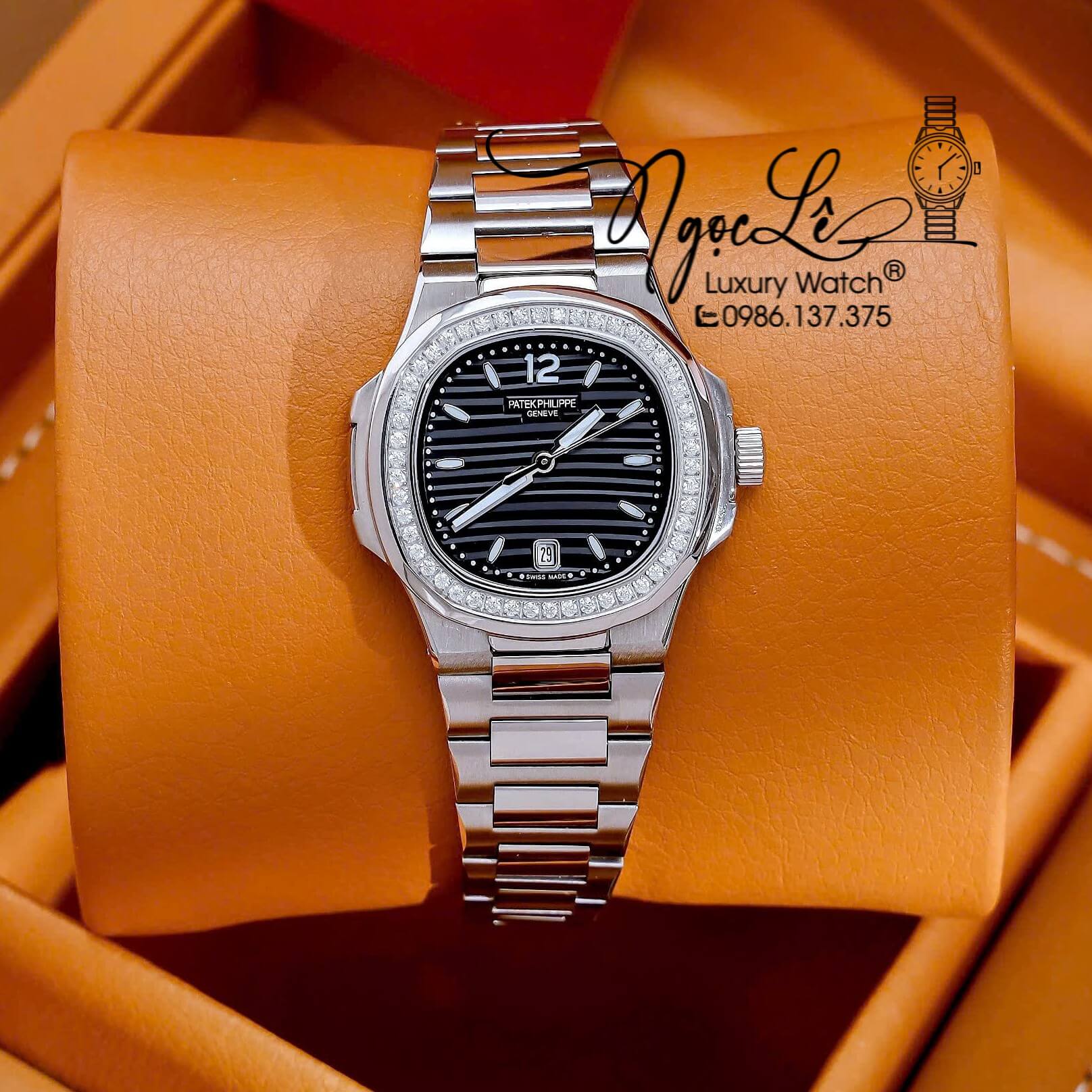 Đồng Hồ Nữ Patek Philippe Nautilus Dây Kim Loại Silver Mặt Đen Viền Đính Đá 32mm - Quartz
