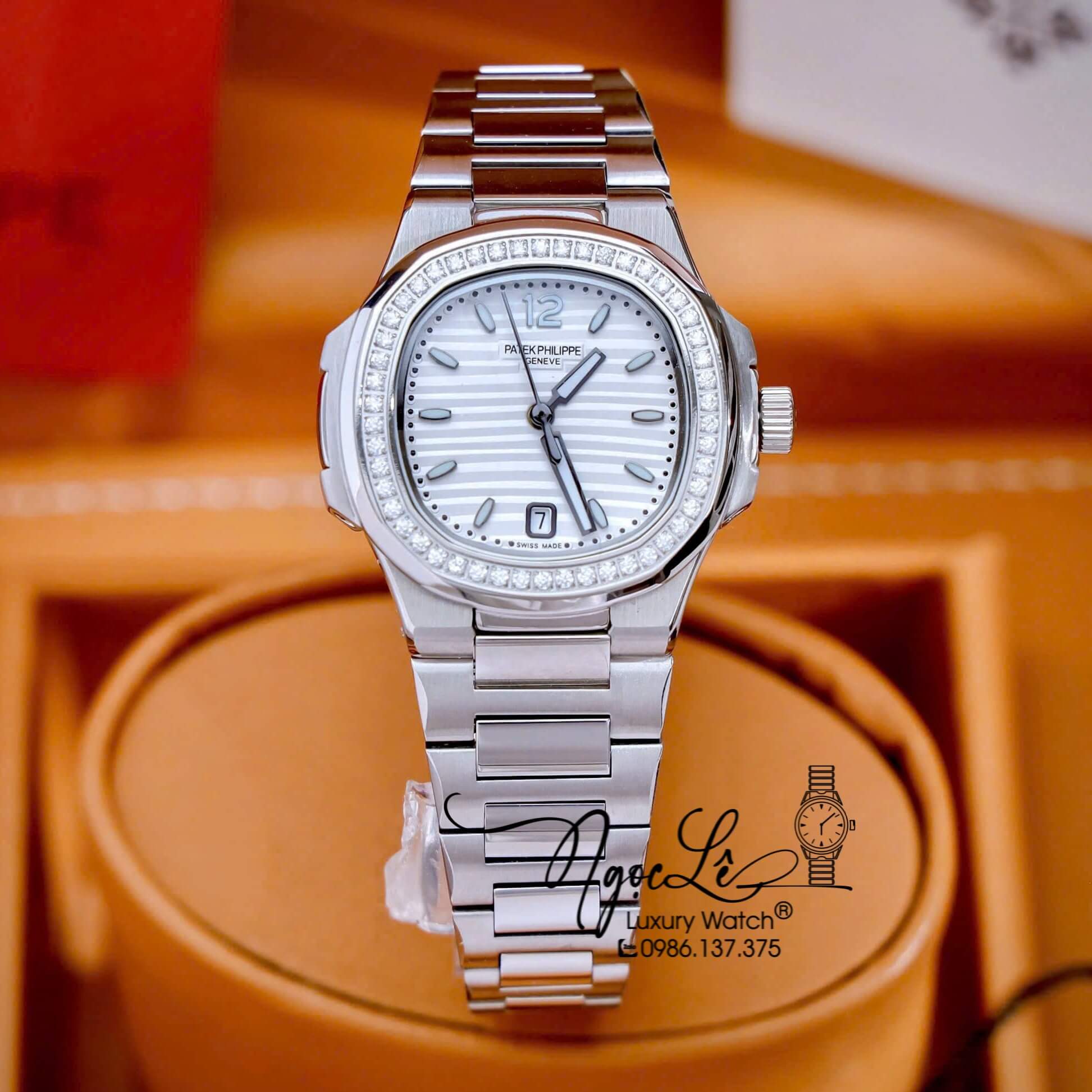 Đồng Hồ Nữ Patek Philippe Nautilus Dây Kim Loại Silver Mặt Trắng Viền Đính Đá 32mm - Quartz