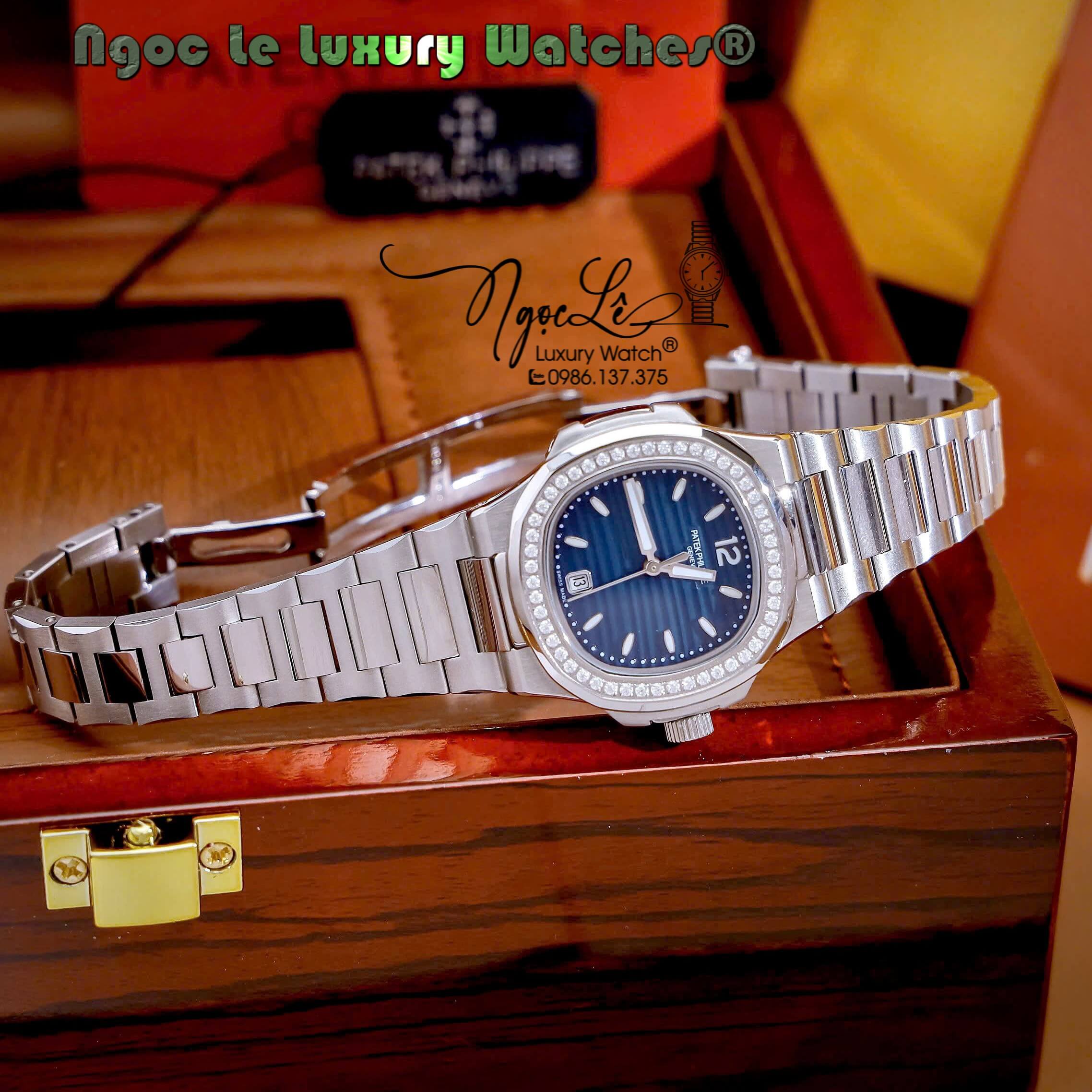 Đồng Hồ Nữ Patek Philippe Nautilus Dây Kim Loại Silver Mặt Xanh Dương Viền Đính Đá 32mm - Quartz