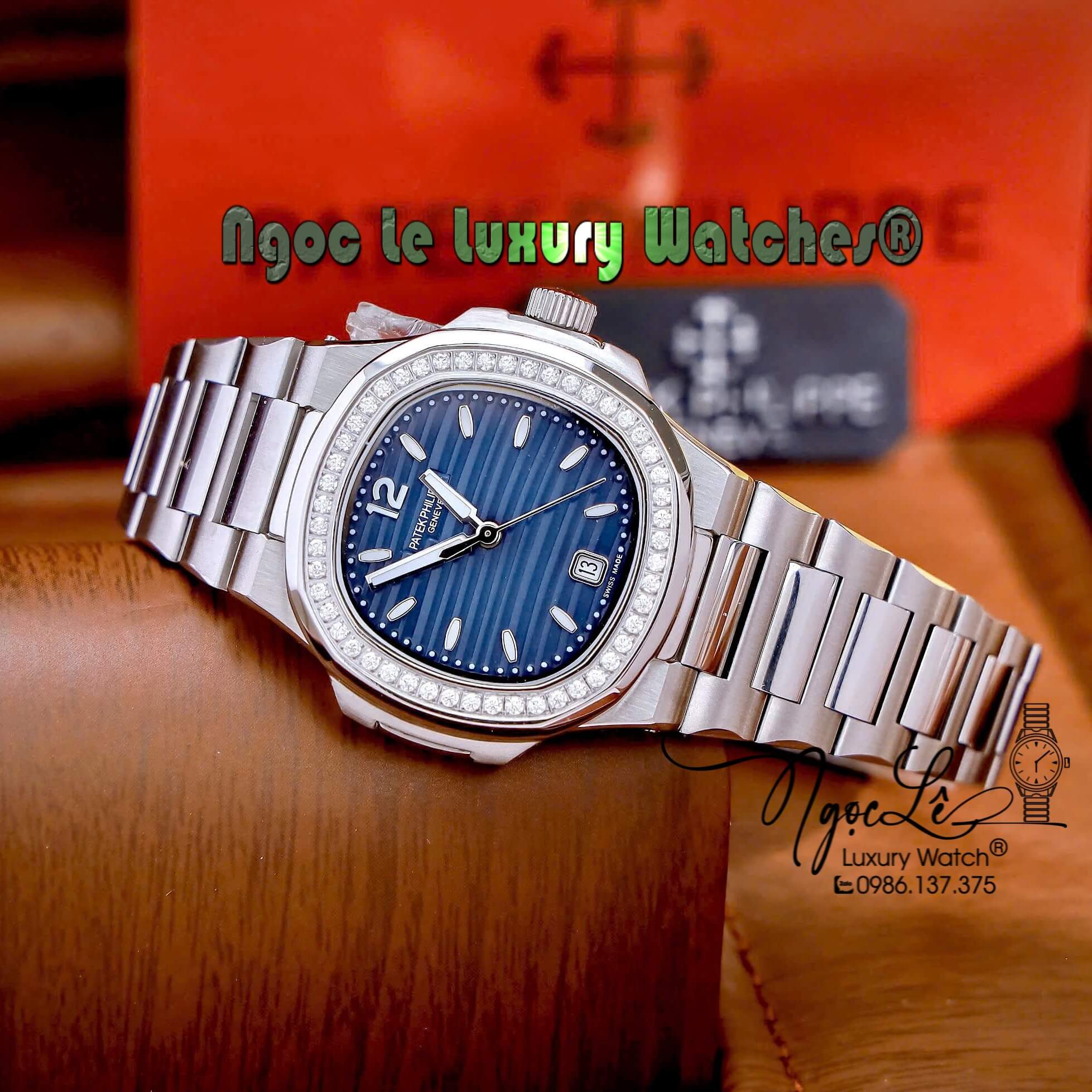 Đồng Hồ Nữ Patek Philippe Nautilus Dây Kim Loại Silver Mặt Xanh Dương Viền Đính Đá 32mm - Quartz