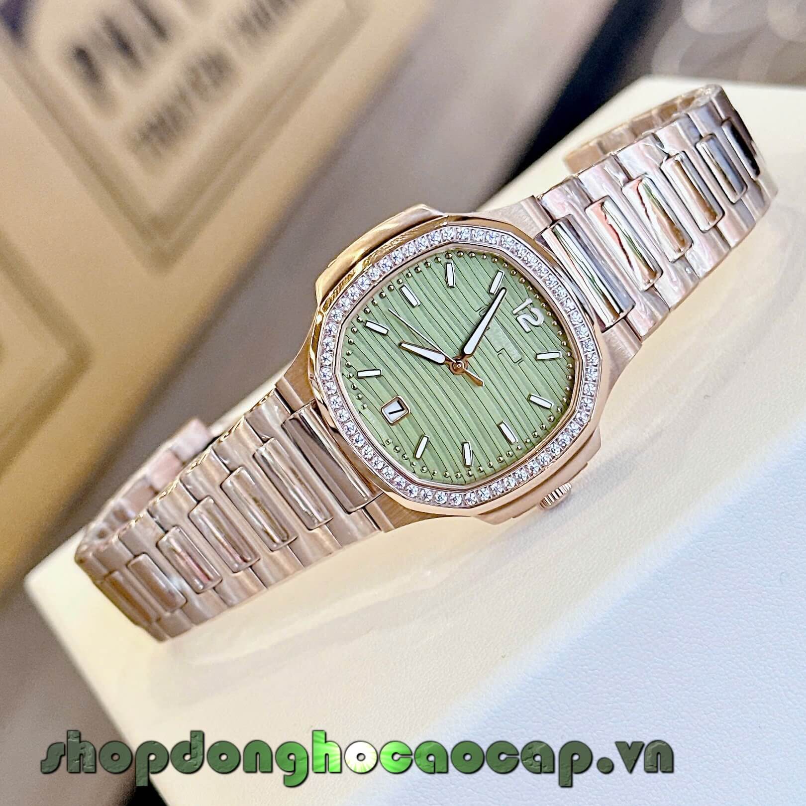 Đồng Hồ Nữ Patek Philippe Nautilus Màu Rose Gold Mặt Xanh Oliu Máy Thụy Sĩ Size 36mm - Viền Đá
