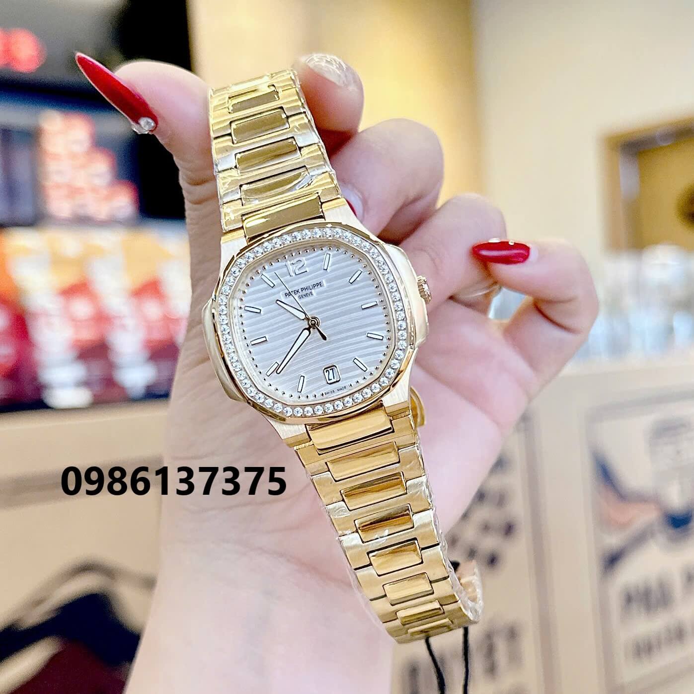 Đồng Hồ Nữ Patek Philippe Nautilus Màu Vàng Gold Mặt Trắng Máy Thụy Sĩ Size 36mm - Viền Đá