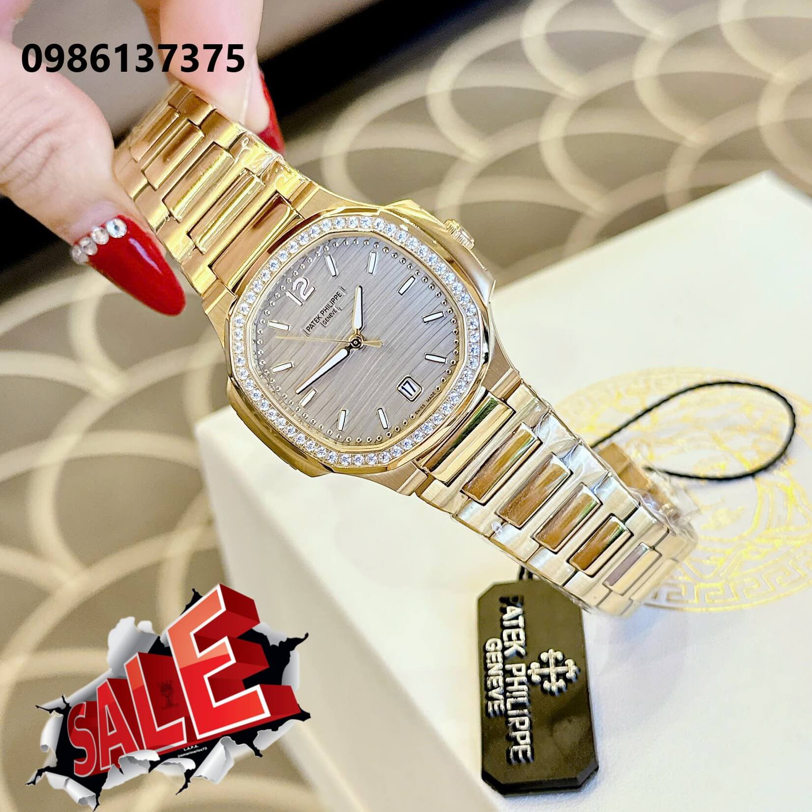 Đồng Hồ Nữ Patek Philippe Nautilus Màu Vàng Gold Mặt Xám Grey Máy Thụy Sĩ Size 36mm - Viền Đá