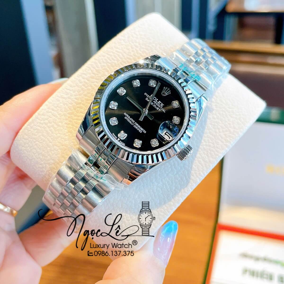 Đồng Hồ Nữ Rolex Datejust Máy Cơ Tự Động Dây Bạc Mặt Đen Niềng Khía Size 31mm