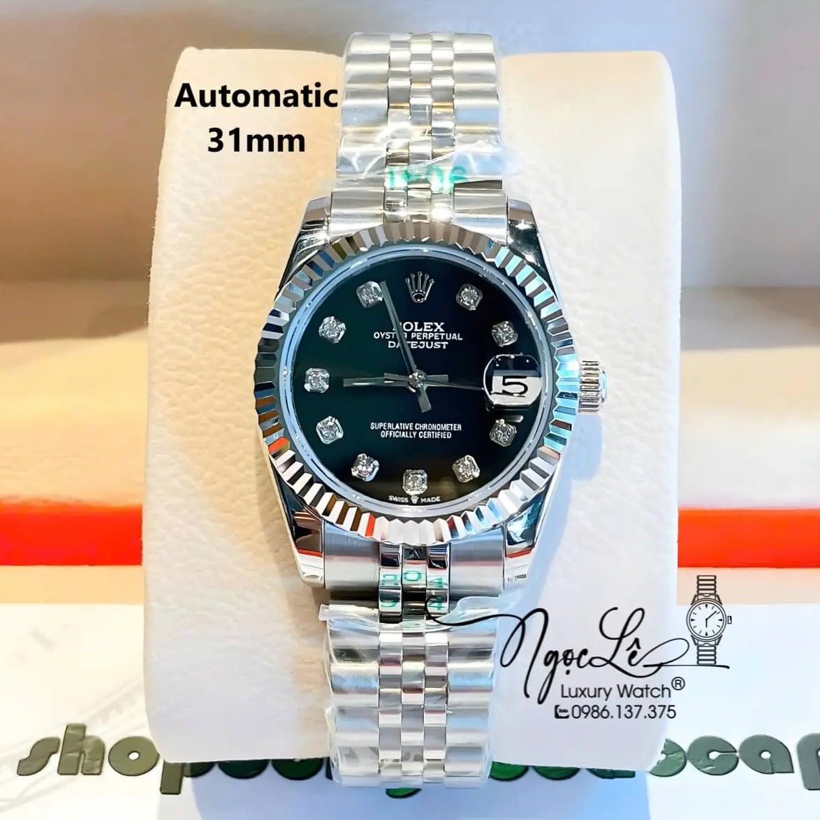 Đồng Hồ Nữ Rolex Datejust Máy Cơ Tự Động Dây Bạc Mặt Đen Niềng Khía Size 31mm