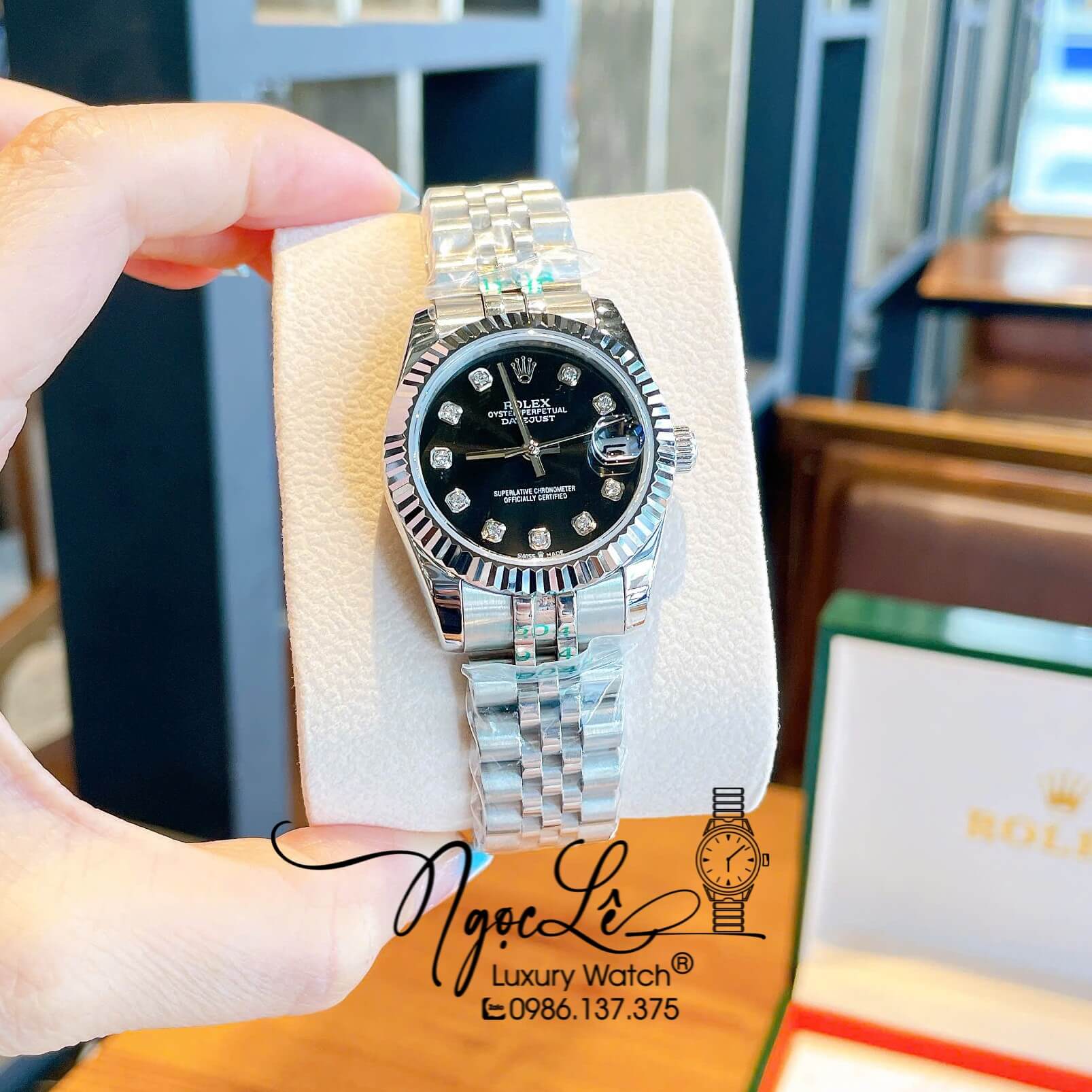 Đồng Hồ Nữ Rolex Datejust Máy Cơ Tự Động Dây Bạc Mặt Đen Niềng Khía Size 31mm