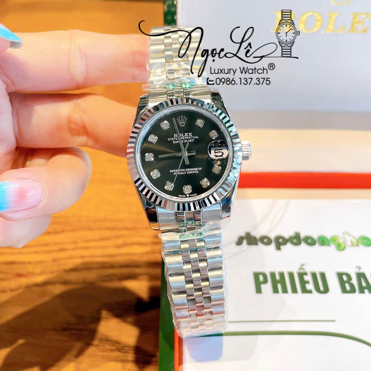 Đồng Hồ Nữ Rolex Datejust Máy Cơ Tự Động Dây Bạc Mặt Đen Niềng Khía Size 31mm