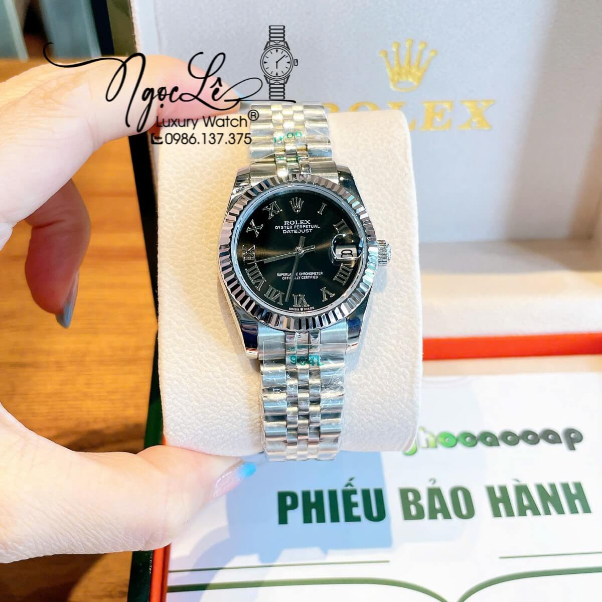 Đồng Hồ Nữ Rolex Datejust Máy Cơ Tự Động Dây Bạc Mặt Đen Niềng Khía Size 31mm - Mặt Số La Mã