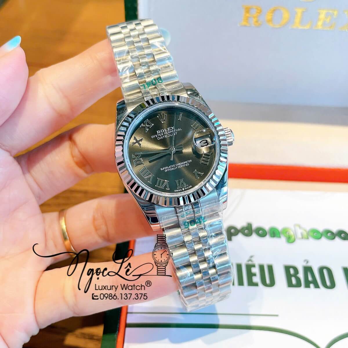 Đồng Hồ Nữ Rolex Datejust Máy Cơ Tự Động Dây Bạc Mặt Đen Xám Niềng Khía Size 31mm - Mặt Số La Mã