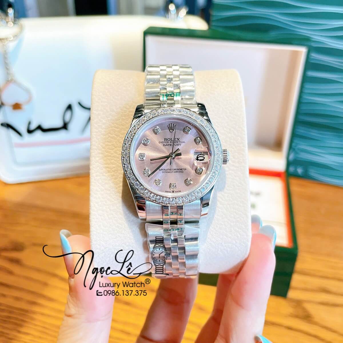 Đồng Hồ Nữ Rolex Datejust Máy Cơ Tự Động Dây Bạc Mặt Hồng Nhạt Đính Đá Size 31mm
