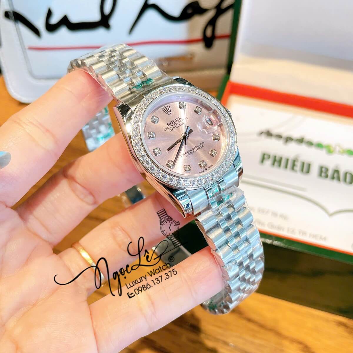 Đồng Hồ Nữ Rolex Datejust Máy Cơ Tự Động Dây Bạc Mặt Hồng Nhạt Đính Đá Size 31mm
