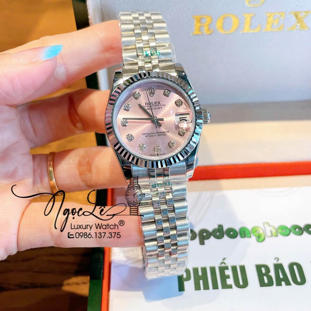 Đồng Hồ Nữ Rolex Datejust Máy Cơ Tự Động Dây Bạc Mặt Hồng Niềng Khía Size 31mm