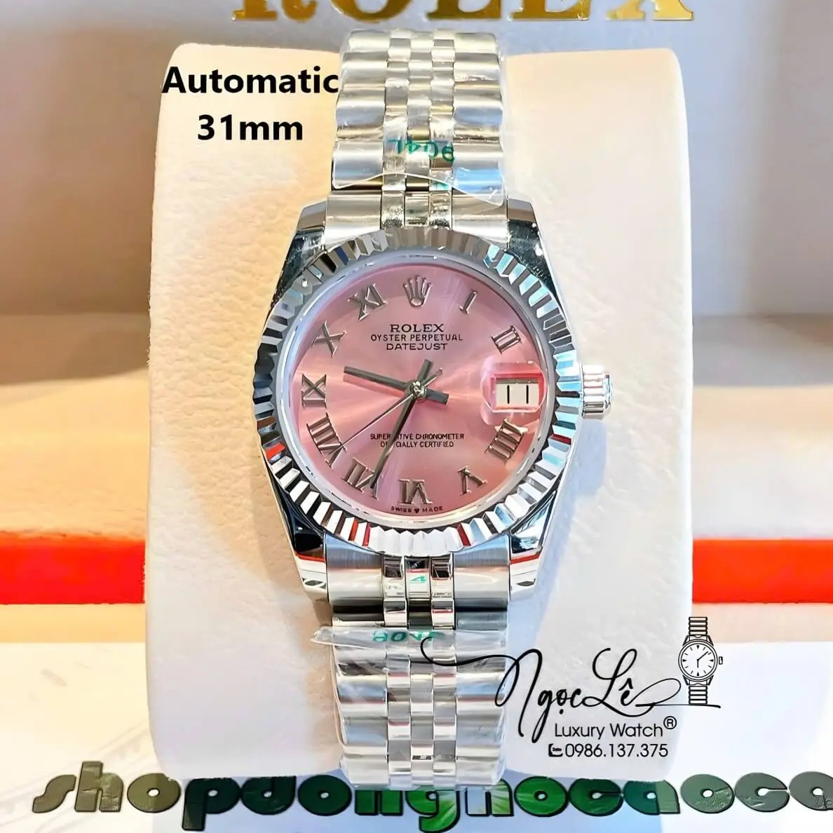 Đồng Hồ Nữ Rolex Datejust Máy Cơ Tự Động Dây Bạc Mặt Hồng Niềng Khía Size 31mm - Mặt Số La Mã