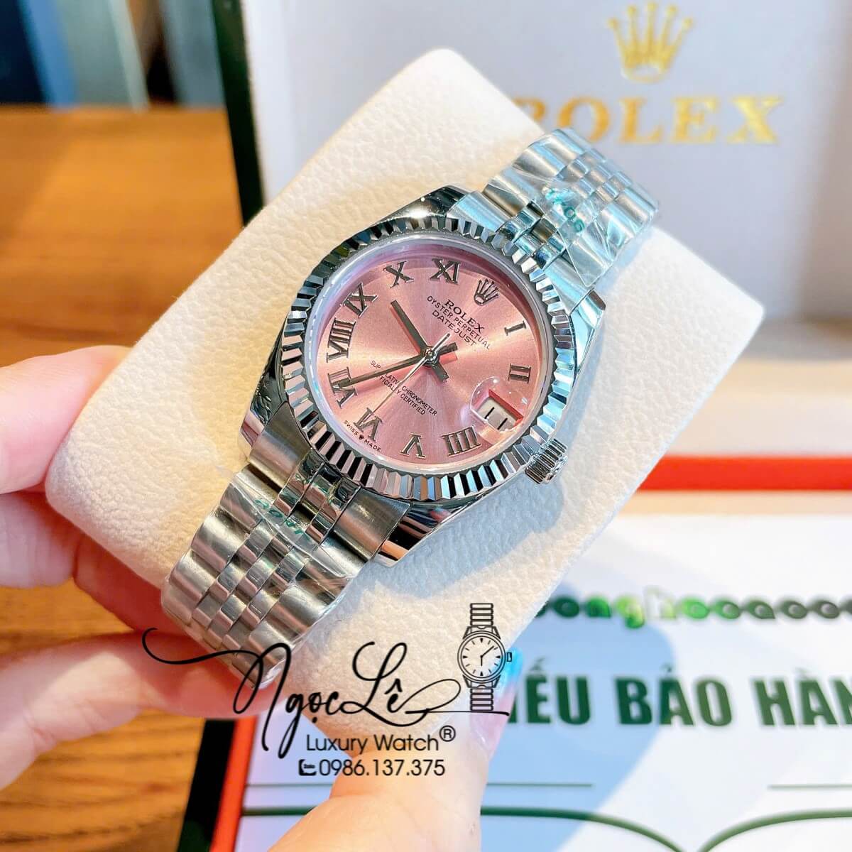 Đồng Hồ Nữ Rolex Datejust Máy Cơ Tự Động Dây Kim Loại Silver Mặt Hồng Niềng Khía Size 31mm - Mặt Số La Mã - Kính Sapphire - Máy Cơ Tự Động Japan - Lịch Ngày Vị Trí 3h  Chiếc Rolex Datejust này là một biểu tượng của sự sang trọng, thanh lịch và đẳng cấp vư