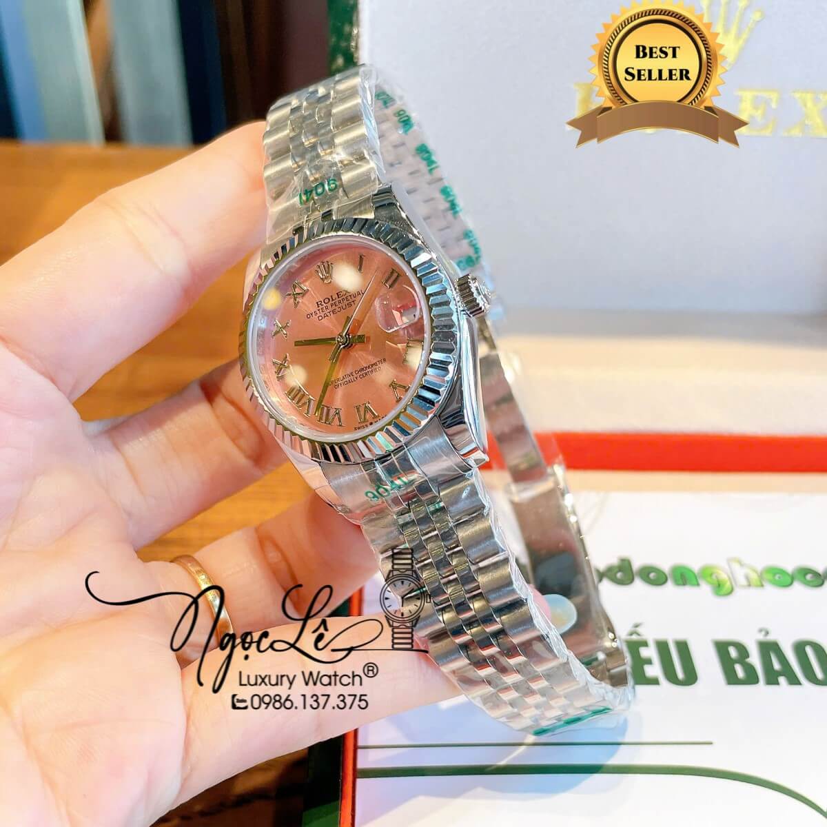 Đồng Hồ Nữ Rolex Datejust Máy Cơ Tự Động Dây Kim Loại Silver Mặt Hồng Niềng Khía Size 31mm - Mặt Số La Mã - Kính Sapphire - Máy Cơ Tự Động Japan - Lịch Ngày Vị Trí 3h  Chiếc Rolex Datejust này là một biểu tượng của sự sang trọng, thanh lịch và đẳng cấp vư