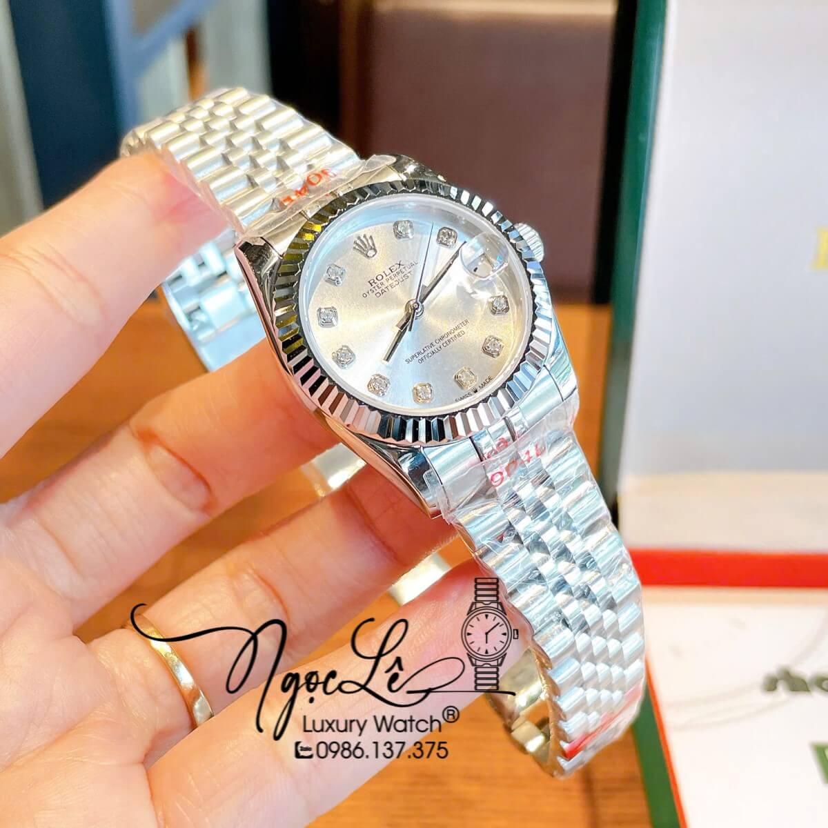 Đồng Hồ Nữ Rolex Datejust Máy Cơ Tự Động Dây Bạc Mặt Trắng Sữa Niềng Khía Size 31mm