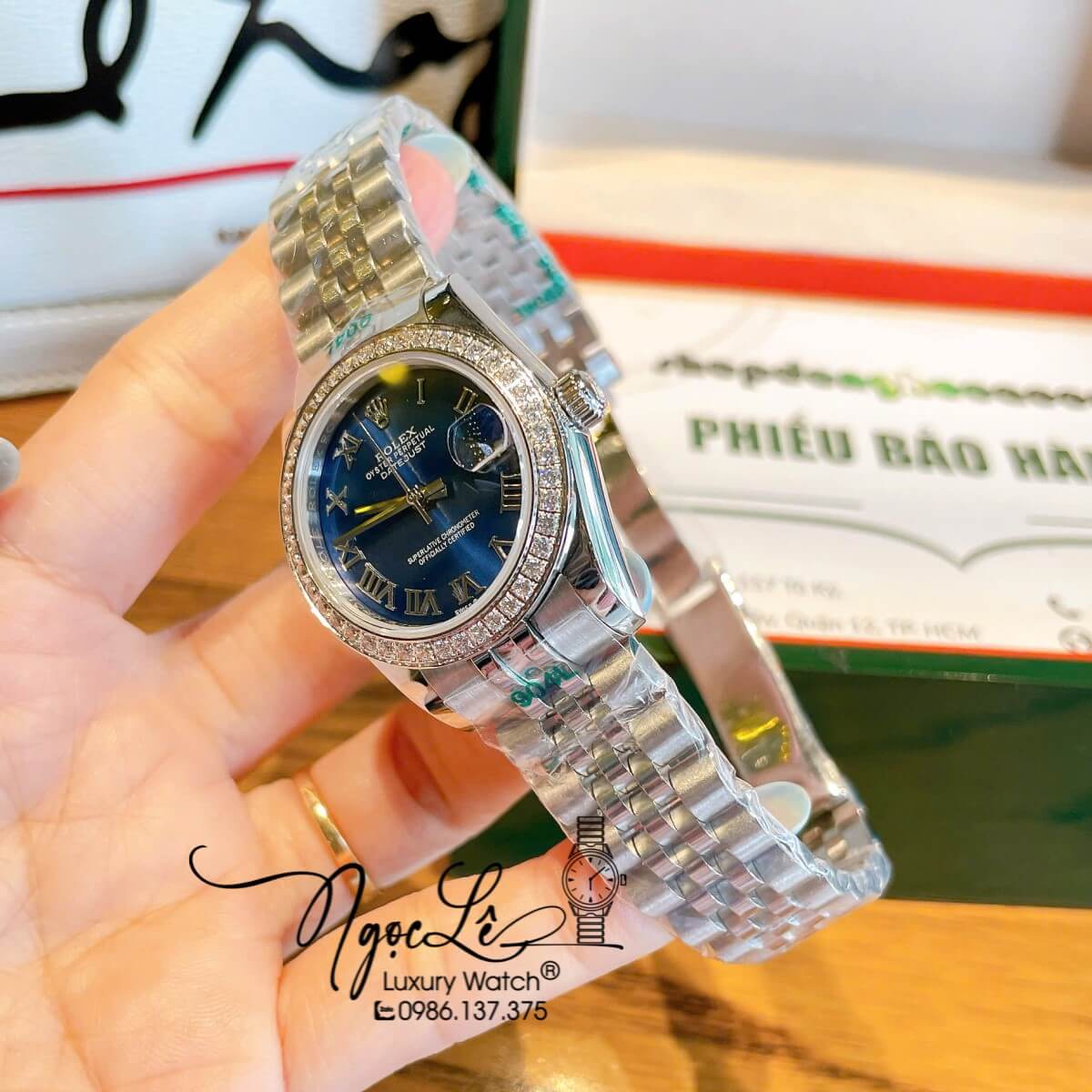 Đồng Hồ Nữ Rolex Datejust Máy Cơ Tự Động Dây Bạc Mặt Xanh Dương Đính Đá Size 31mm - Mặt Số La Mã