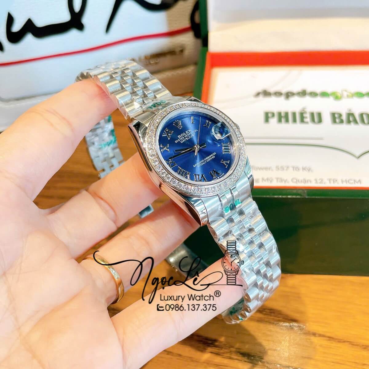 Đồng Hồ Nữ Rolex Datejust Máy Cơ Tự Động Dây Bạc Mặt Xanh Dương Đính Đá Size 31mm - Mặt Số La Mã