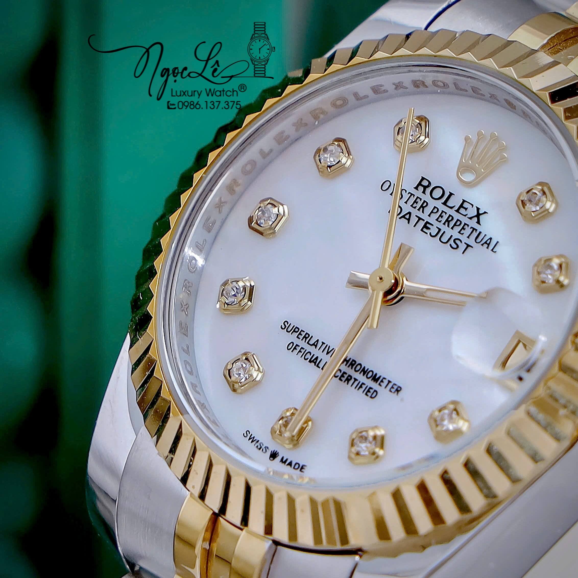 Đồng Hồ Nữ Rolex Datejust Máy Pin Dây Demi Vàng Mặt Trắng Xà Cừ Niềng Khía Size 31mm